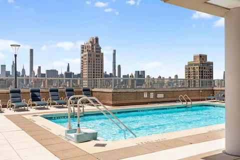 a view of a city with tall buildings