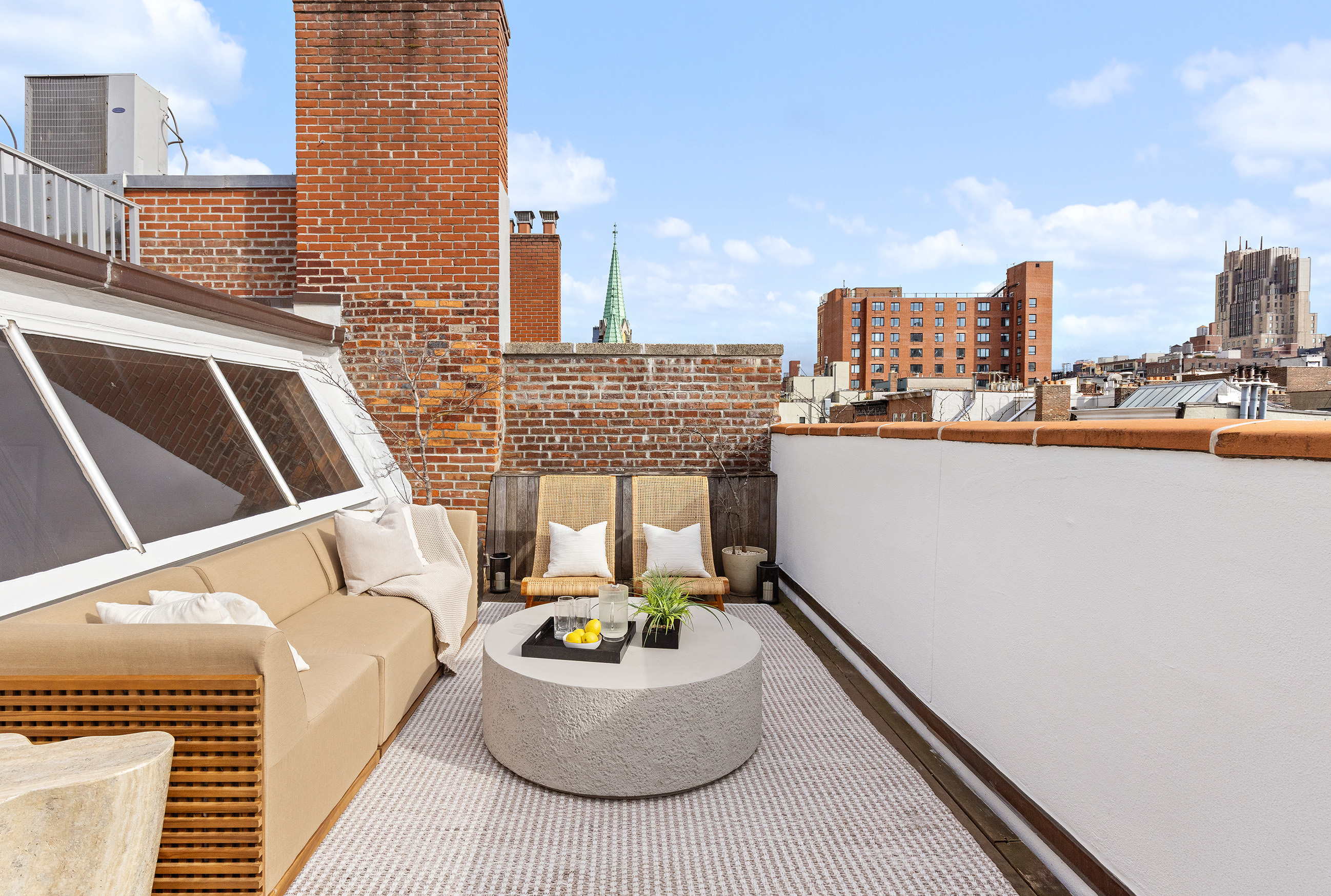 333 West 22nd Street, Unit 5A Manhattan, NY 10011 - Photo 10 of 12 a view of roof deck with patio