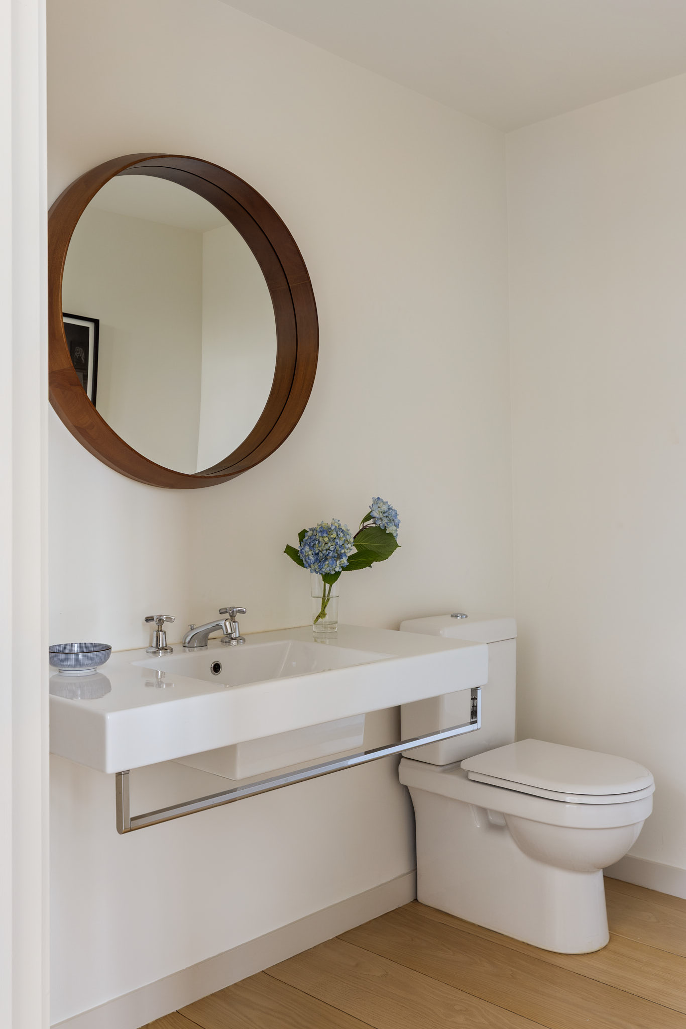456 West 19th Street, Unit PHH Manhattan, NY 10011 - Photo 14 of 21 a bathroom with a sink a mirror and toilet