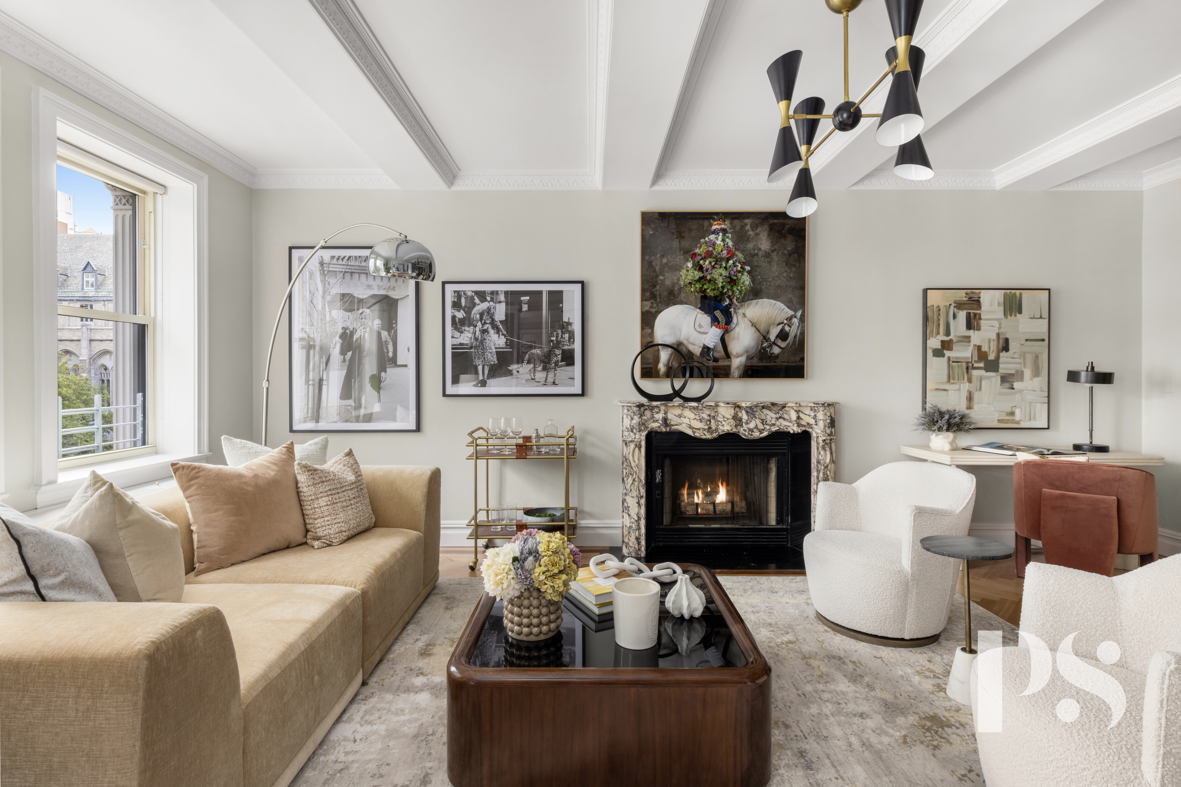 610 Park Avenue, Unit 4B Manhattan, NY 10065 - Photo 4 of 22 a living room with furniture and a fireplace