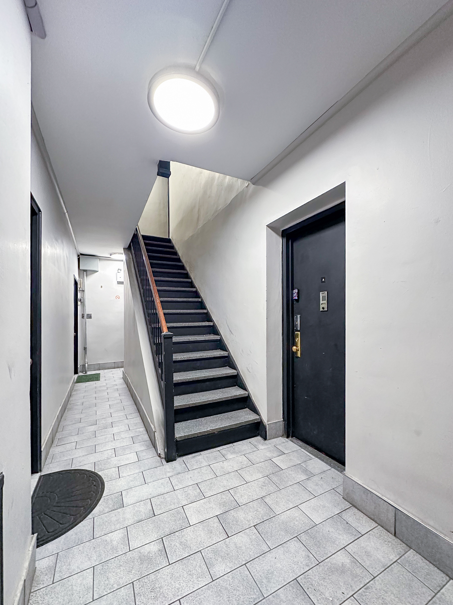 157 East 3rd Street, Unit 2B Manhattan, NY 10009 - Photo 14 of 18 a view of entryway and hall