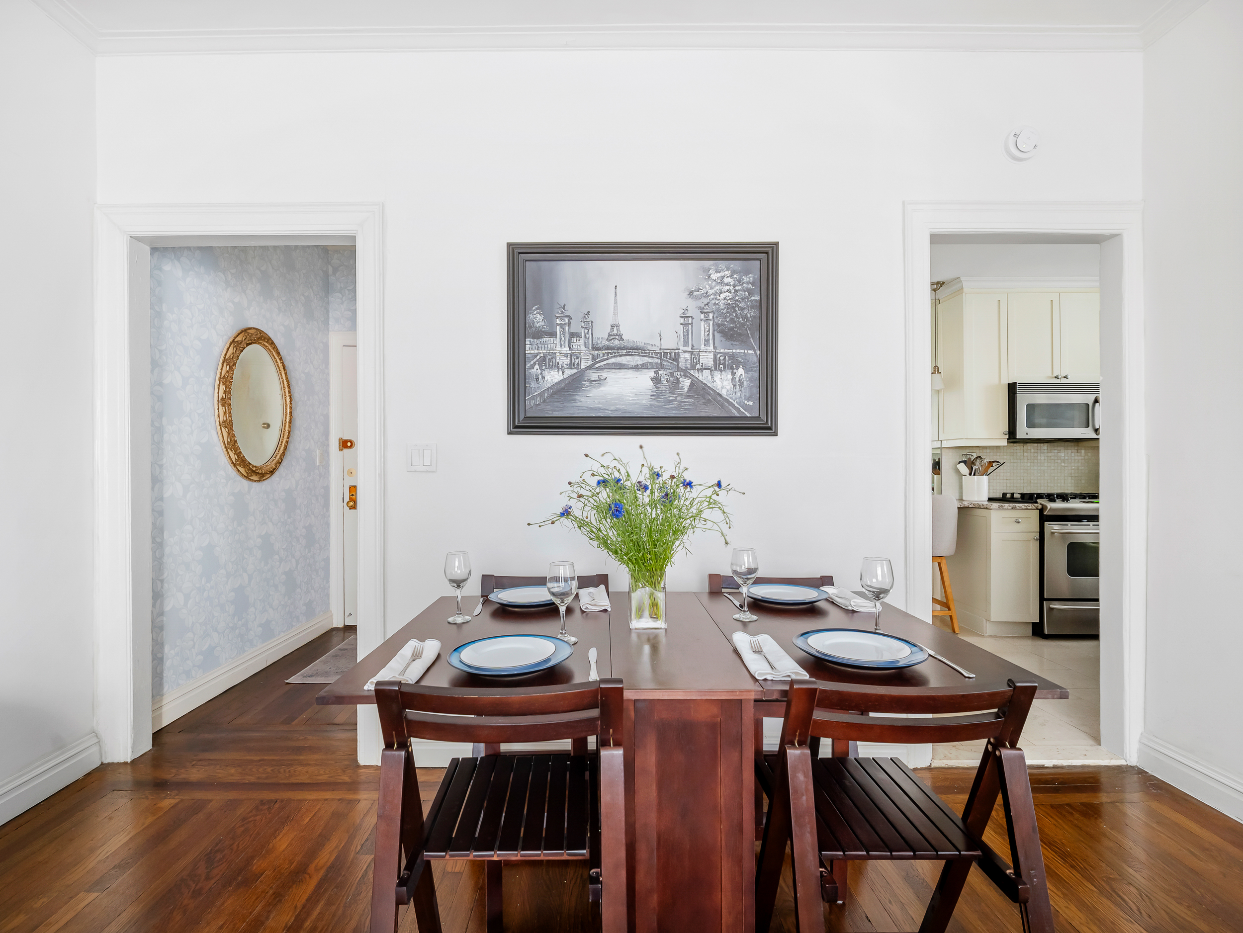 595 West End Avenue, Unit 3C Manhattan, NY 10024 - Photo 2 of 9 a view of a dining room with furniture and wooden floor