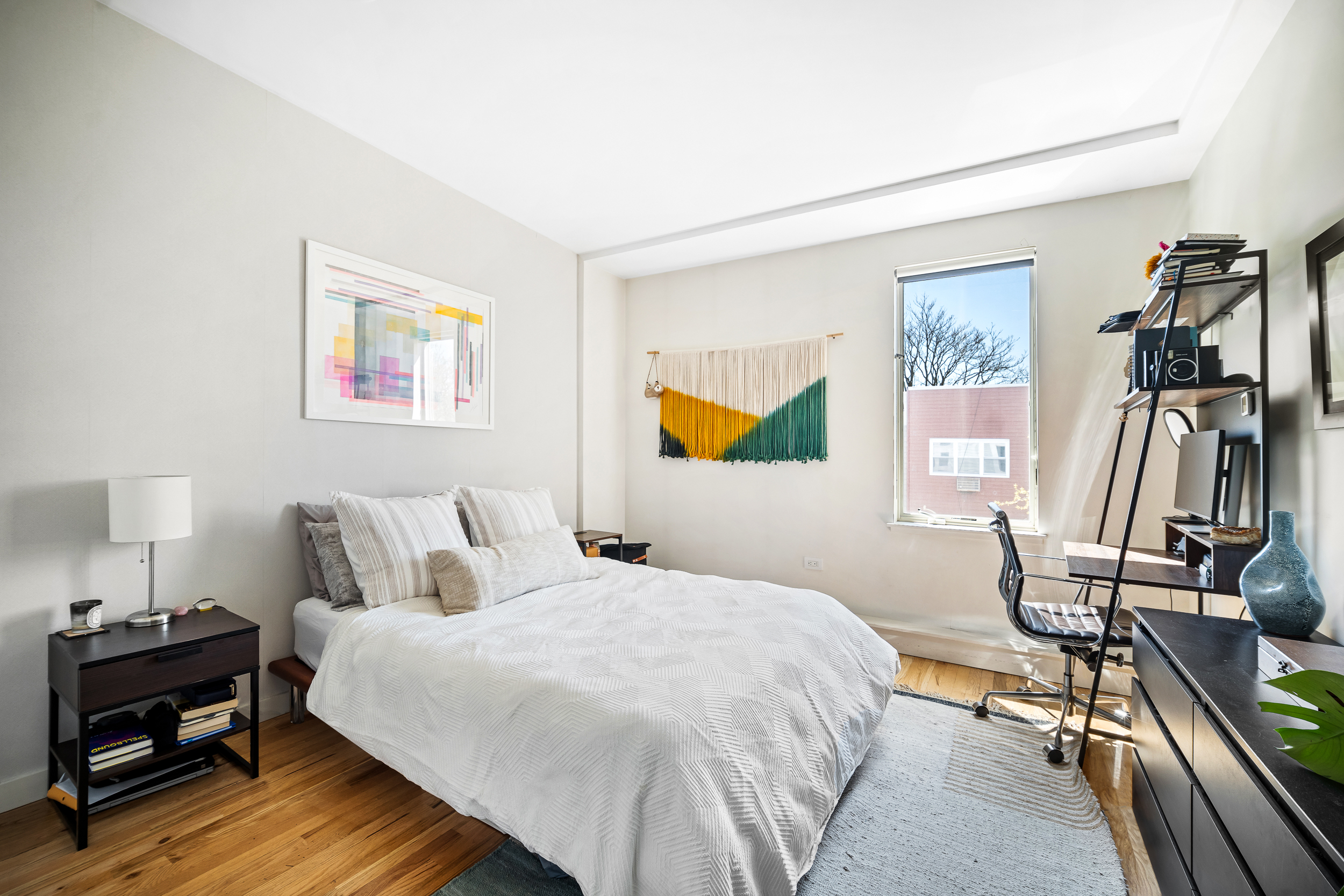 65 Jackson Street Brooklyn, NY 11211 - Photo 30 of 36 a bedroom with a bed and a desk