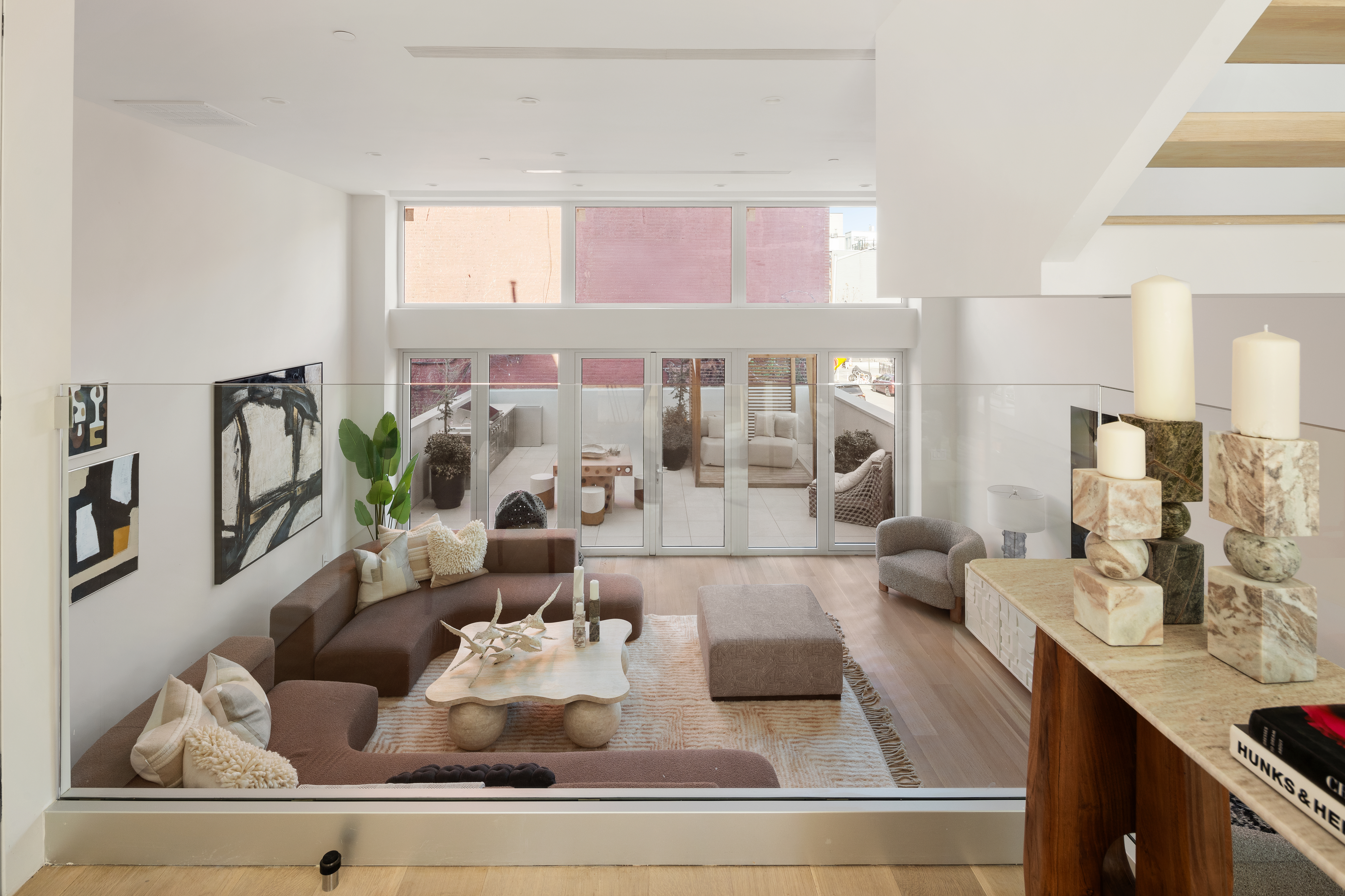 276 Berry Street Brooklyn, NY 11249 - Photo 4 of 36 a living room with furniture and a large window