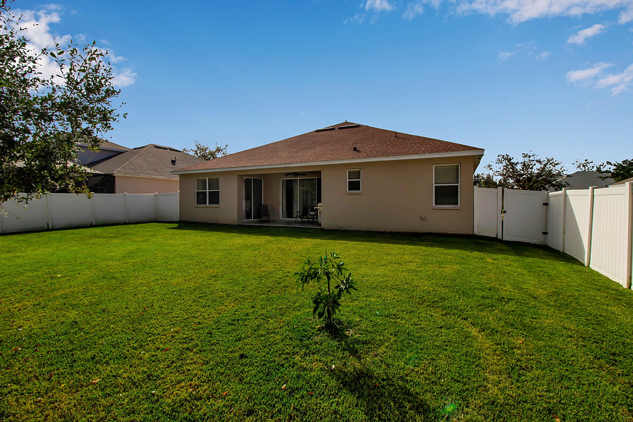 6106 34th Court East Bradenton, FL 34203 - Photo 59 of 69 a front view of a house with garden