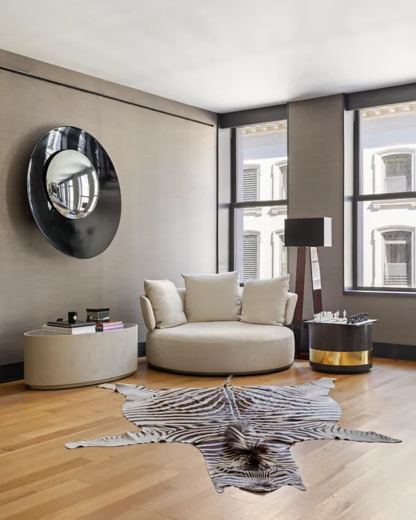 a living room with furniture and a window