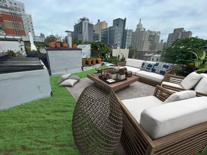 a view of a patio in the backyard