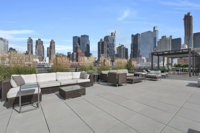 432 West 52nd Street, Unit 3C Manhattan, NY 10019 - Photo 4 of 5 a view of a terrace with sitting area