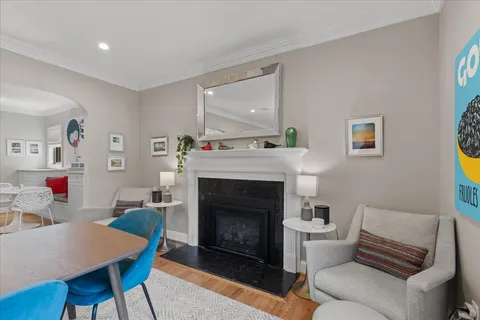 a kitchen with stainless steel appliances a refrigerator sink and microwave