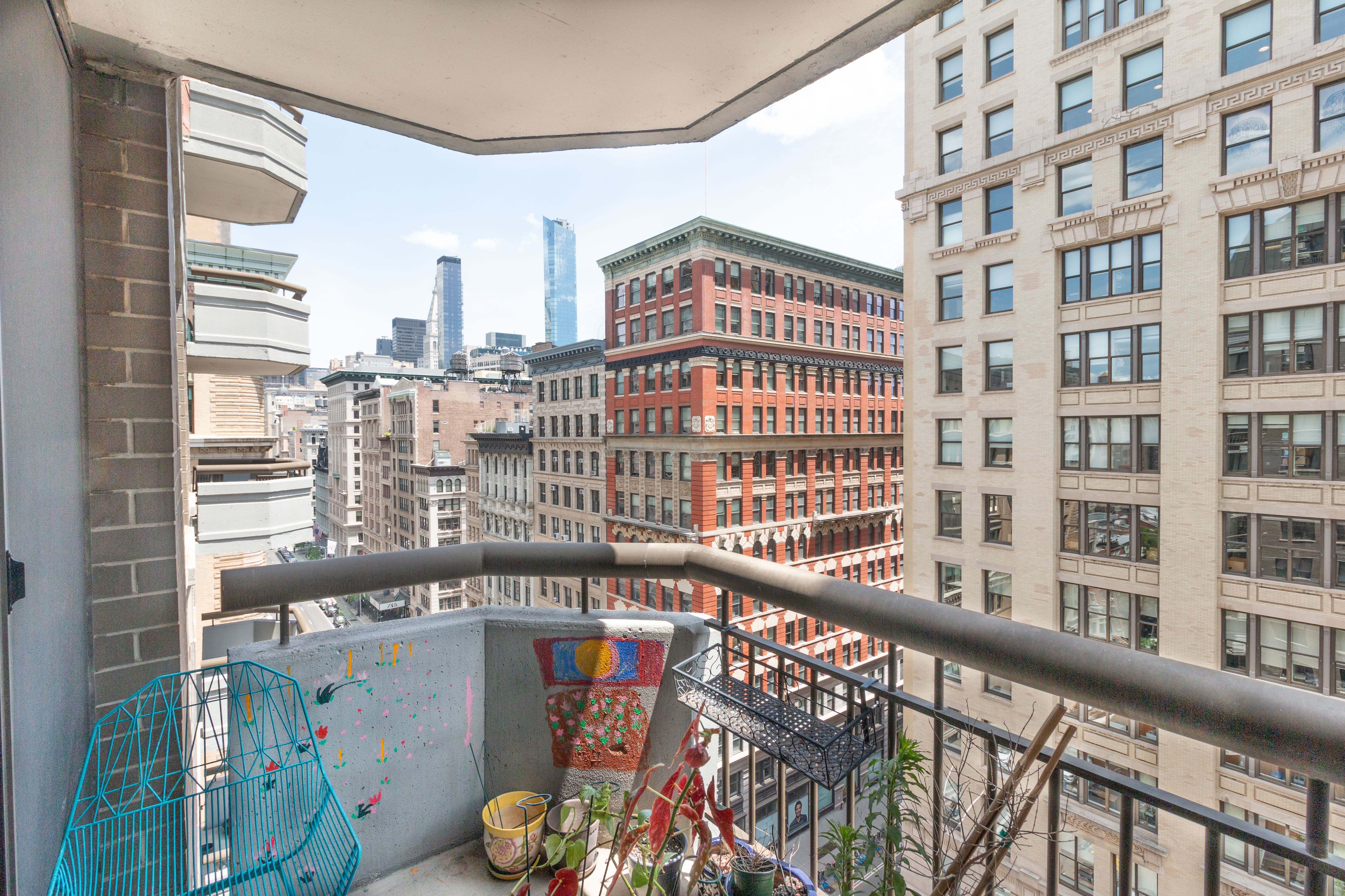 108 5th Avenue, Unit 15C Manhattan, NY 10011 - Photo 9 of 12 a view of a city from a balcony