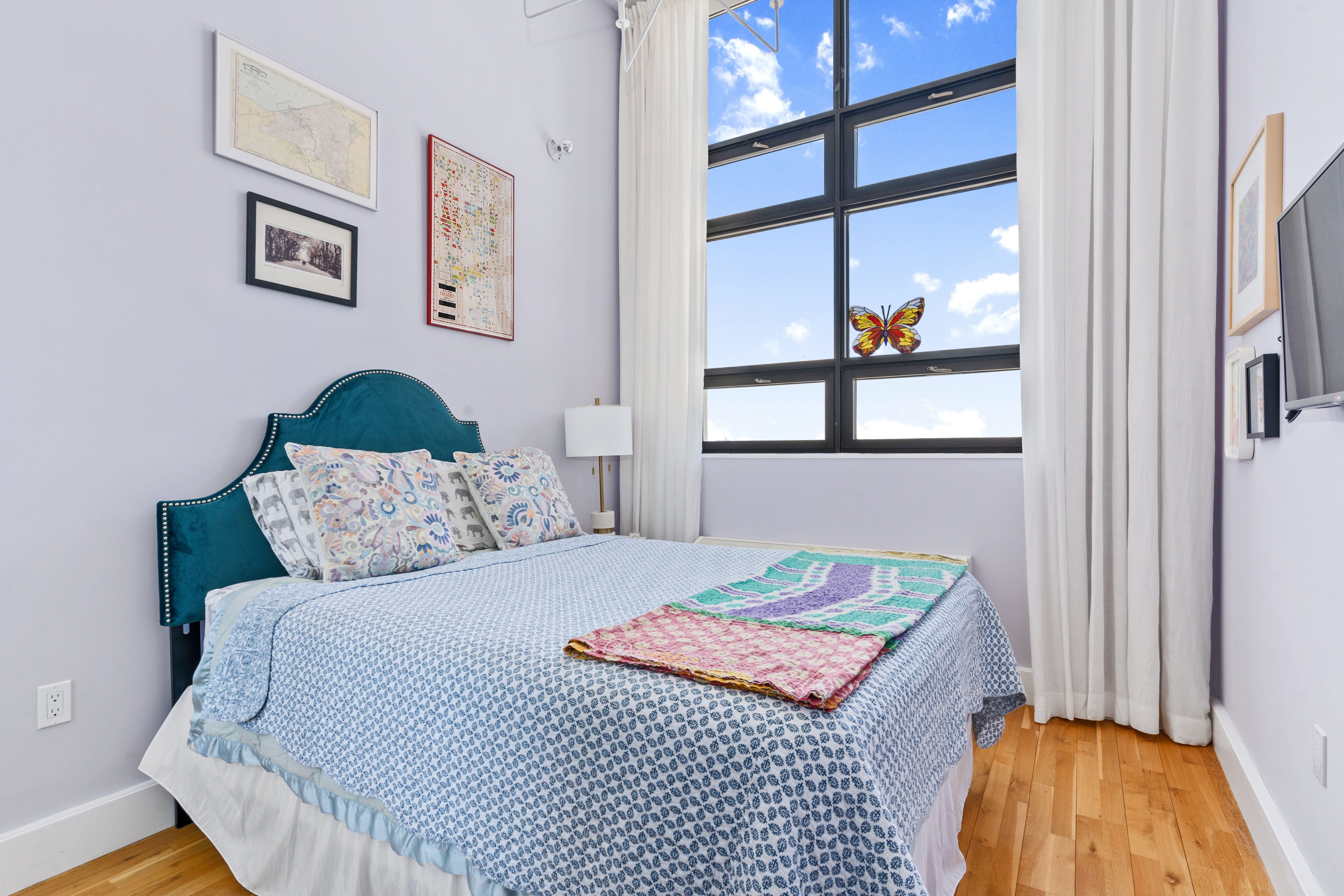 360 Furman Street, Unit 734 Brooklyn, NY 11201 - Photo 18 of 31 a bedroom with a bed and a window