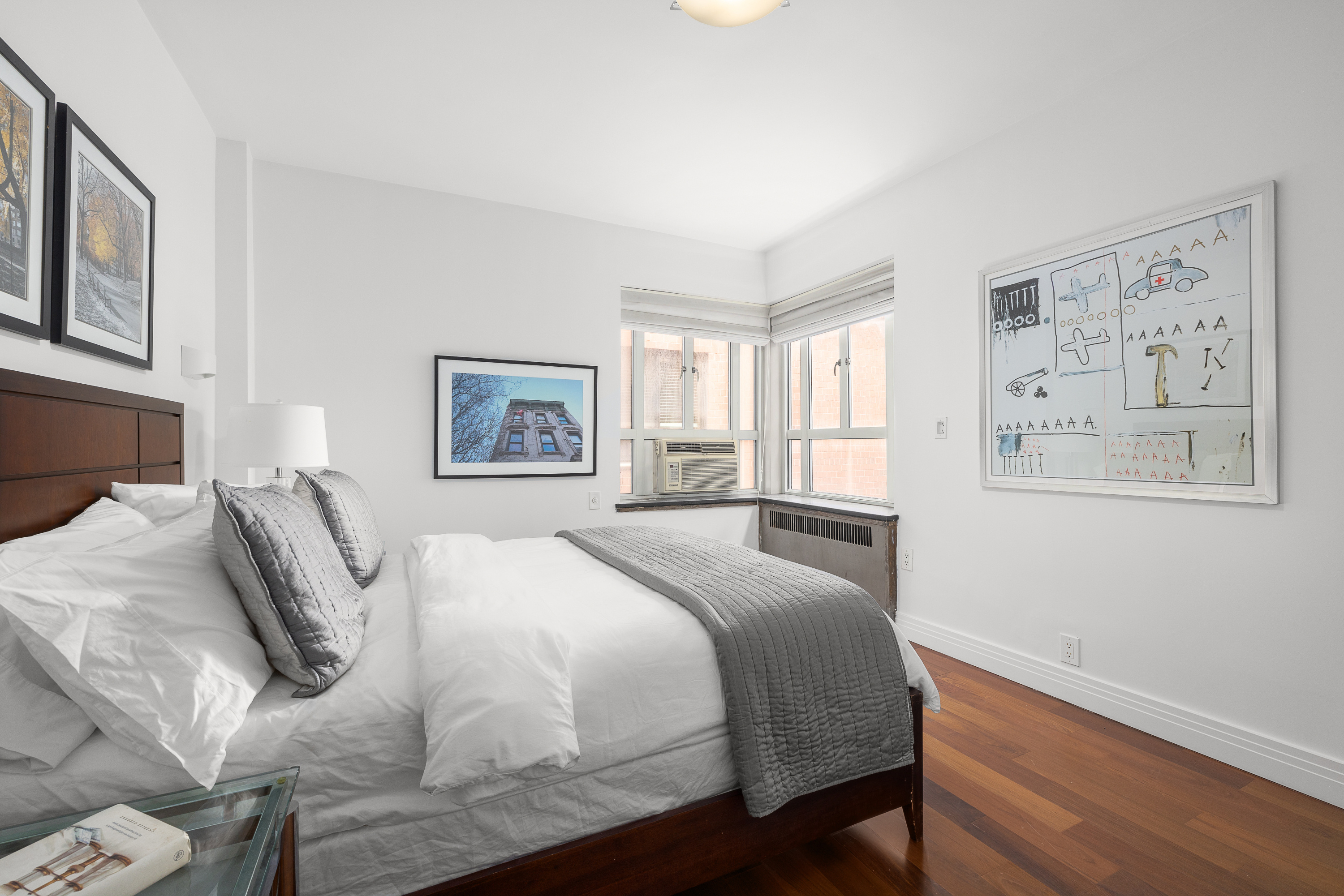 165 West 20th Street, Unit 3L Manhattan, NY 10011 - Photo 4 of 7 a bedroom with a bed and a window