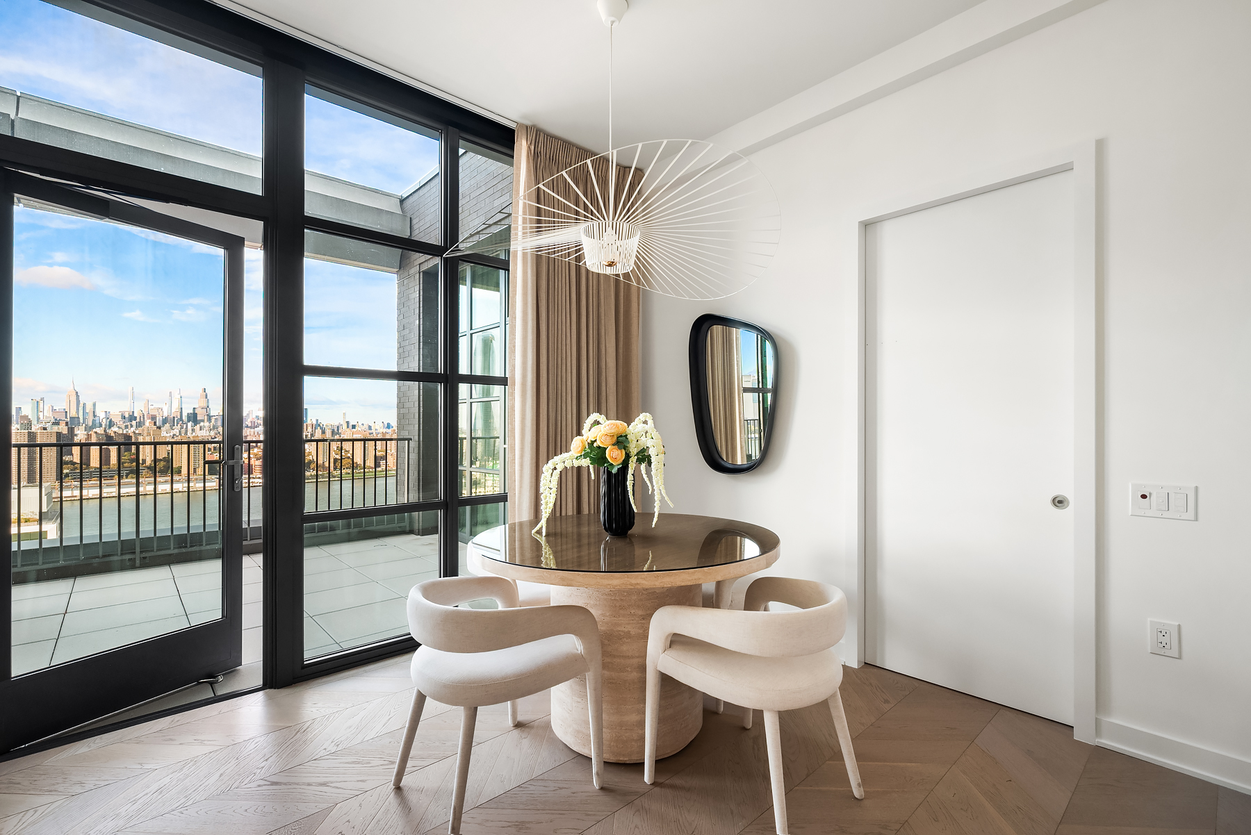 115 York Street, Unit PH20B Brooklyn, NY 11201 - Photo 4 of 21 a dining room with furniture and a large window