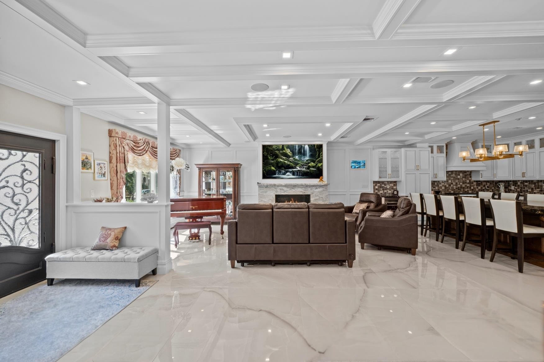 2253 East 64th Street Brooklyn, NY 11234 - Photo 6 of 45 a living room with furniture and a flat screen tv