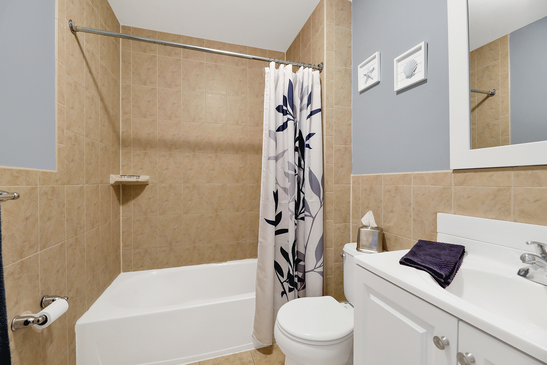 102-20 Rockaway Beach Boulevard, Unit 3C Queens, NY 11694 - Photo 17 of 36 a bathroom with a sink a toilet and a bathtub