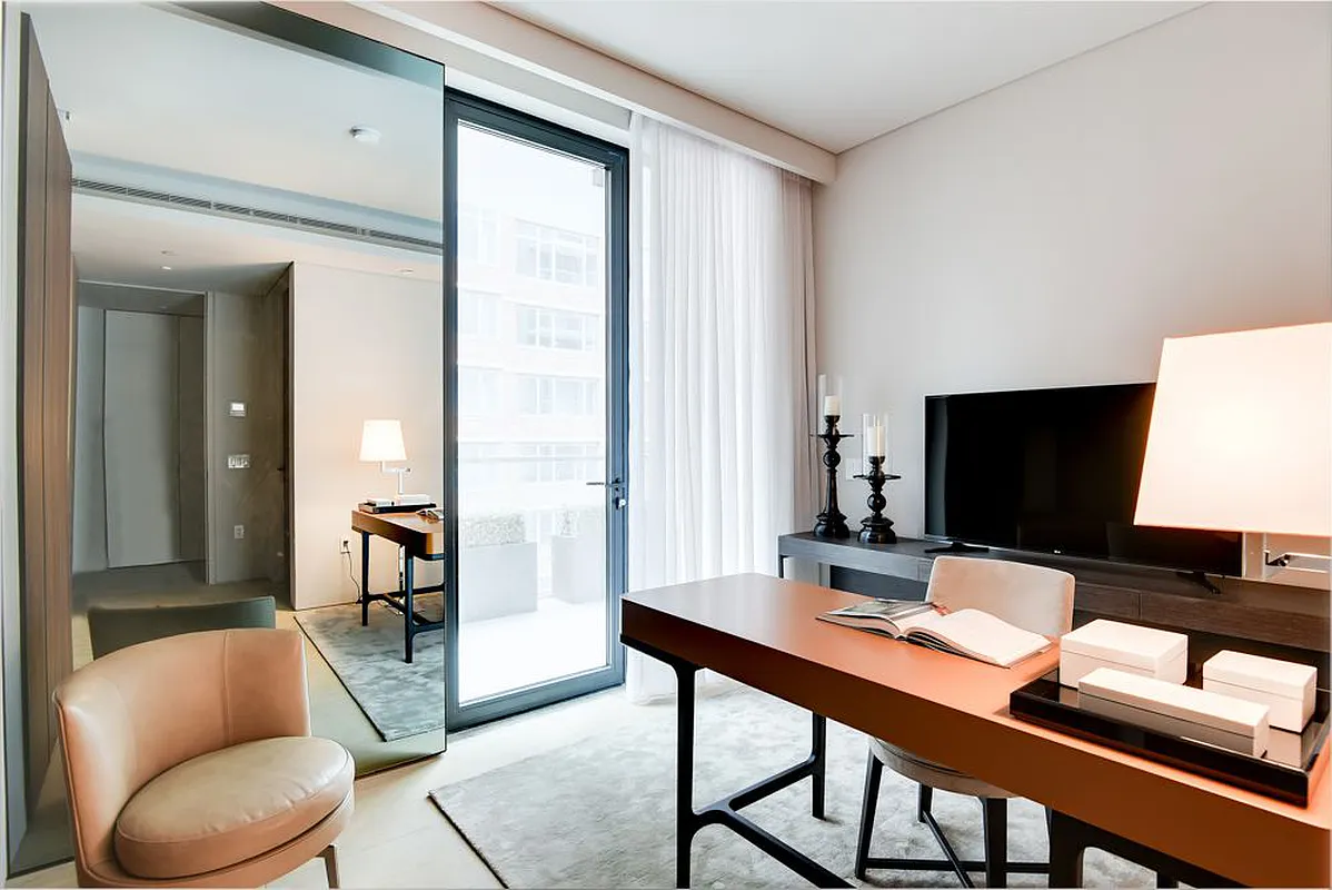 522 West 29th Street, Unit 4D Manhattan, NY 10001 - Photo 4 of 12 a workspace with furniture and window