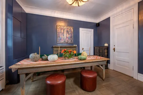 a room with furniture and chandelier