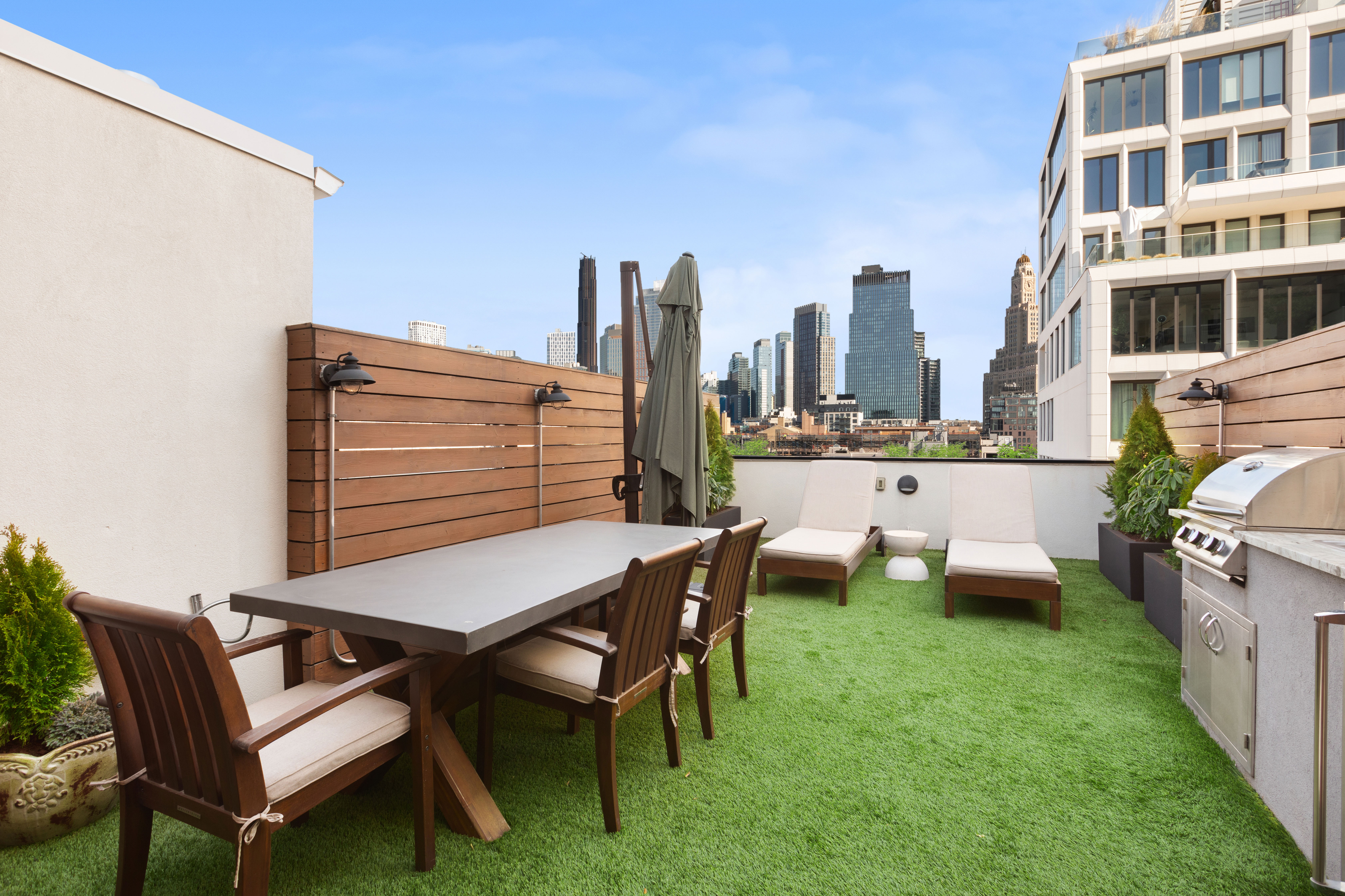 610 Warren Street, Unit 5F Brooklyn, NY 11217 - Photo 11 of 14 a view of a patio with a table and chairs
