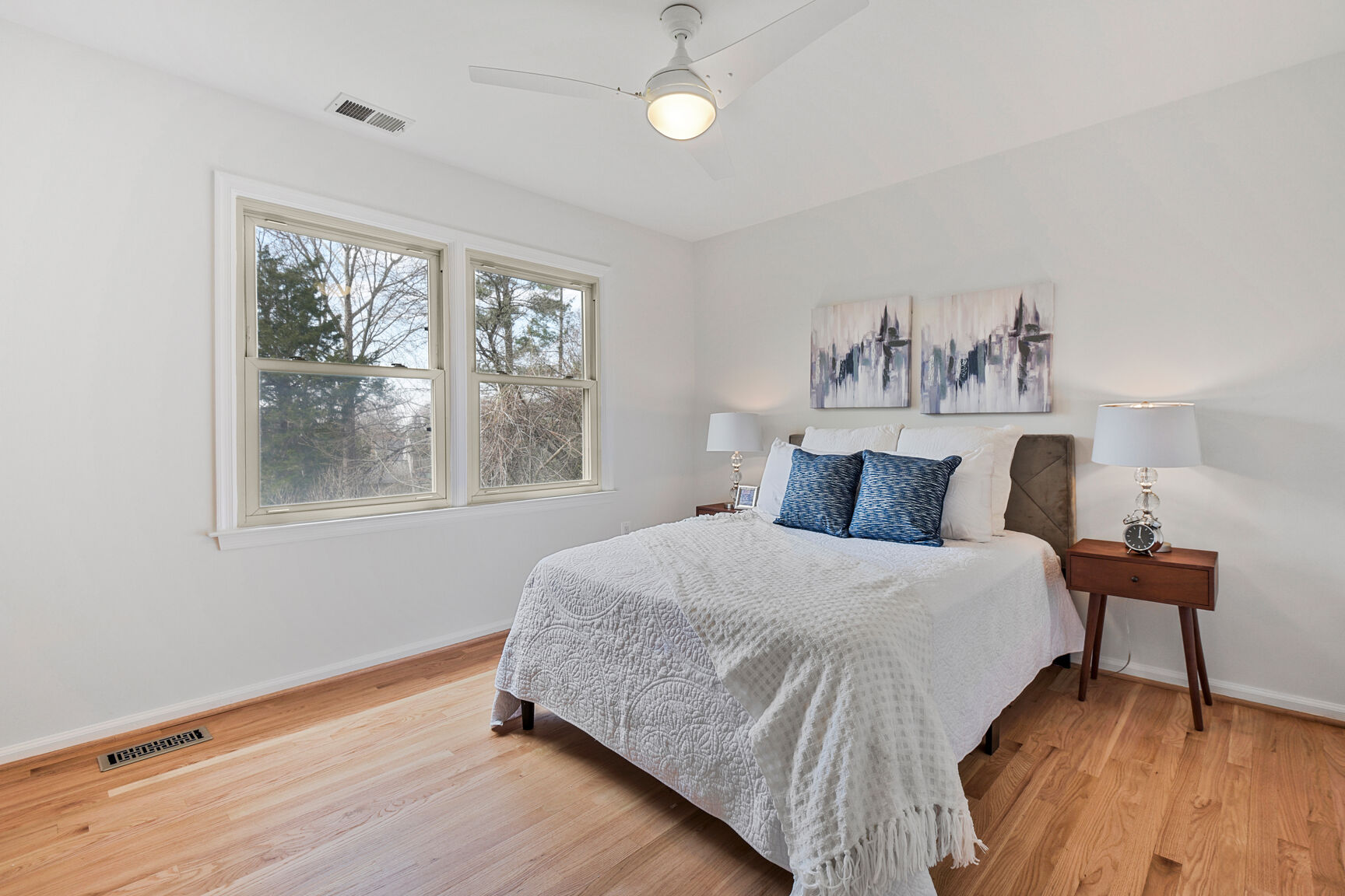 4008 Evangeline Terrace Olney, MD 20832 - Photo 38 of 54 a bedroom with a bed and wooden floor