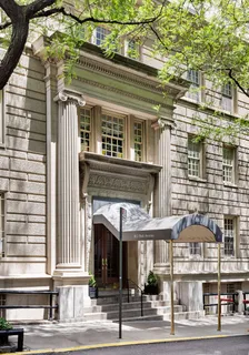 a front view of a building and a street