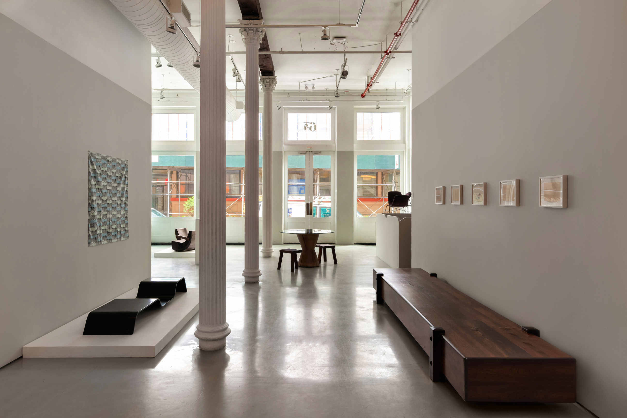 64 White Street, Unit RETAIL Manhattan, NY 10013 - Photo 5 of 21 a living room with furniture and a large window