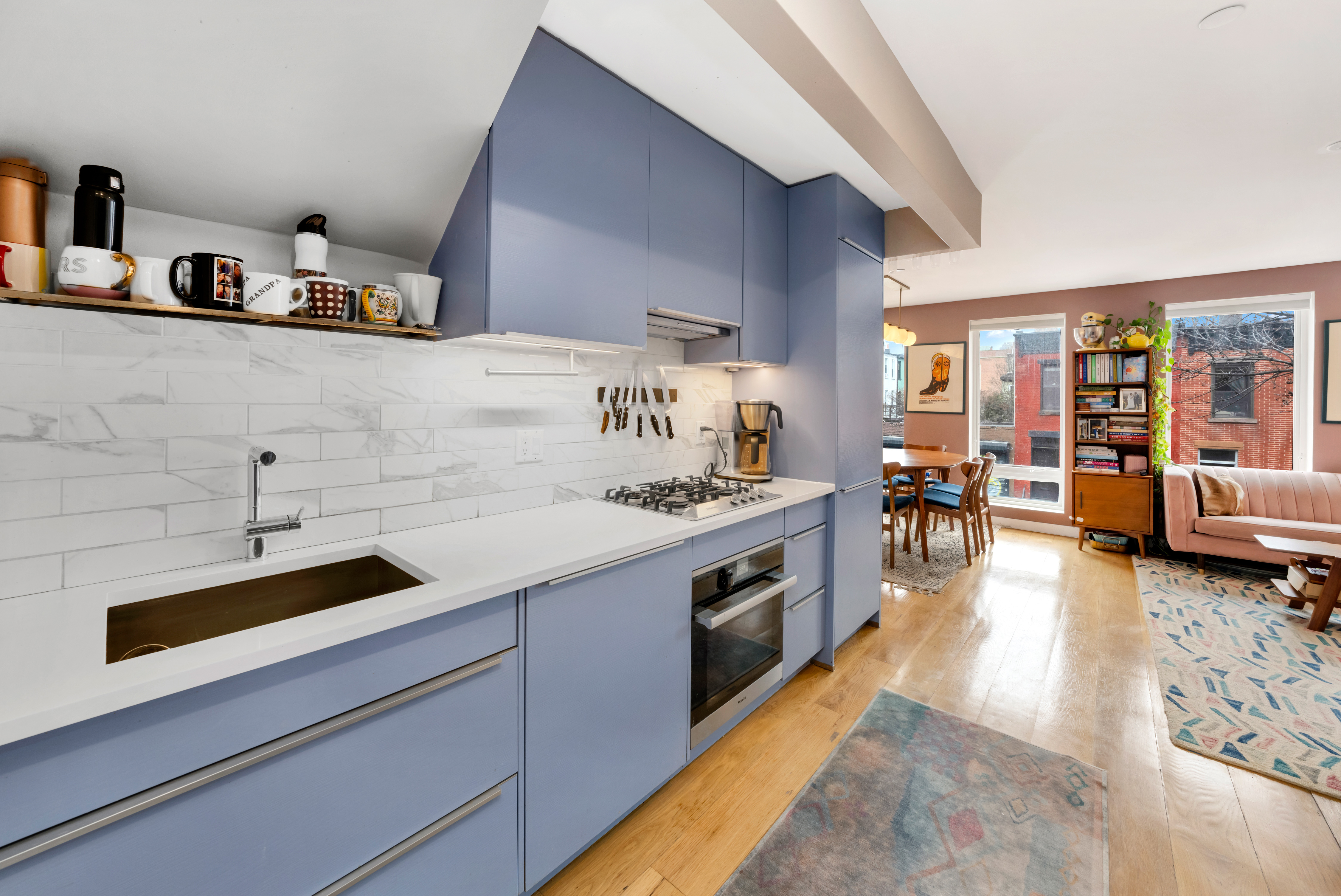316 Carroll Street, Unit 2 Brooklyn, NY 11231 - Photo 3 of 12 a kitchen with a sink dishwasher stove and wooden cabinets