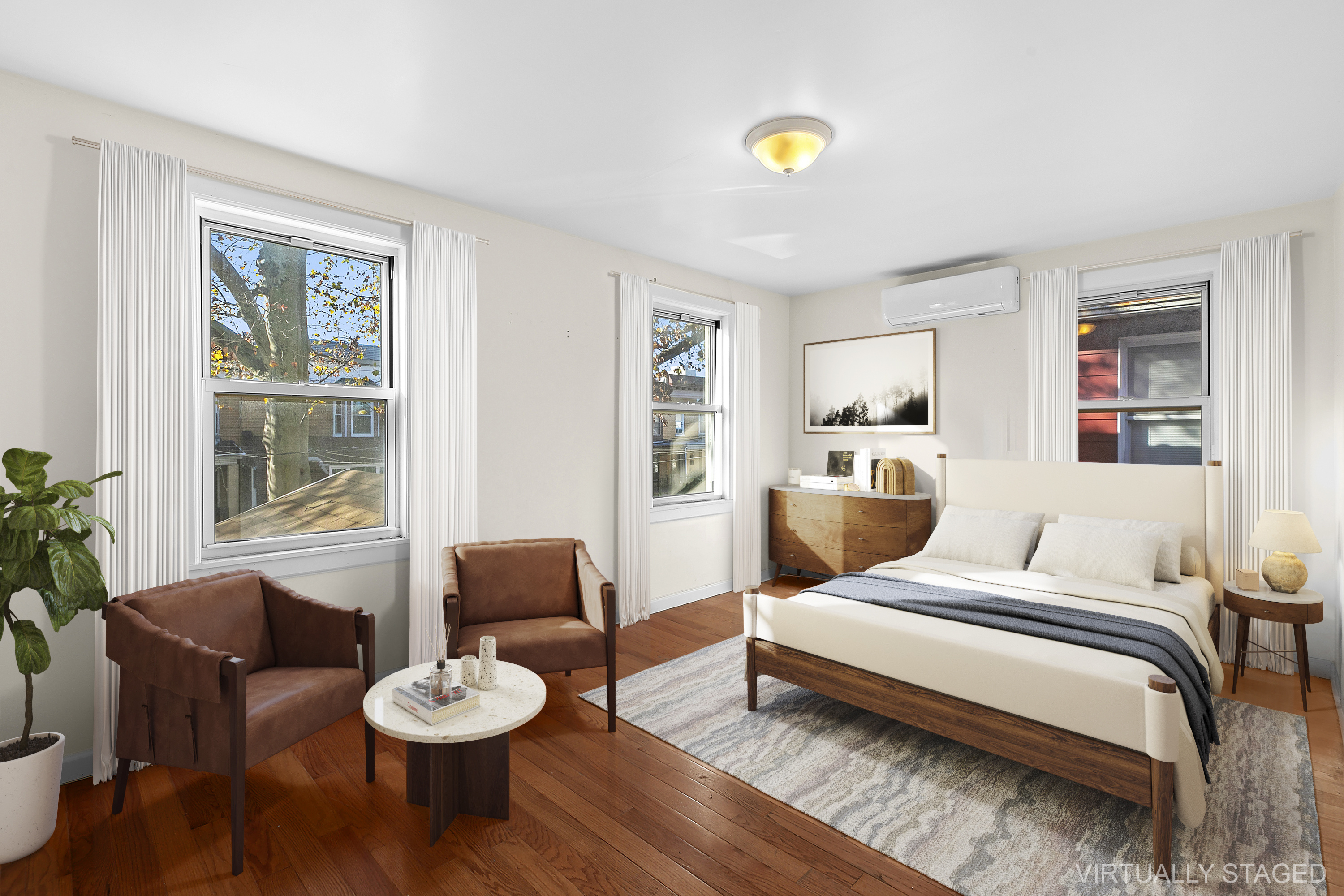 945 East 32nd Street Brooklyn, NY 11210 - Photo 6 of 11 a living room with furniture and wooden floor