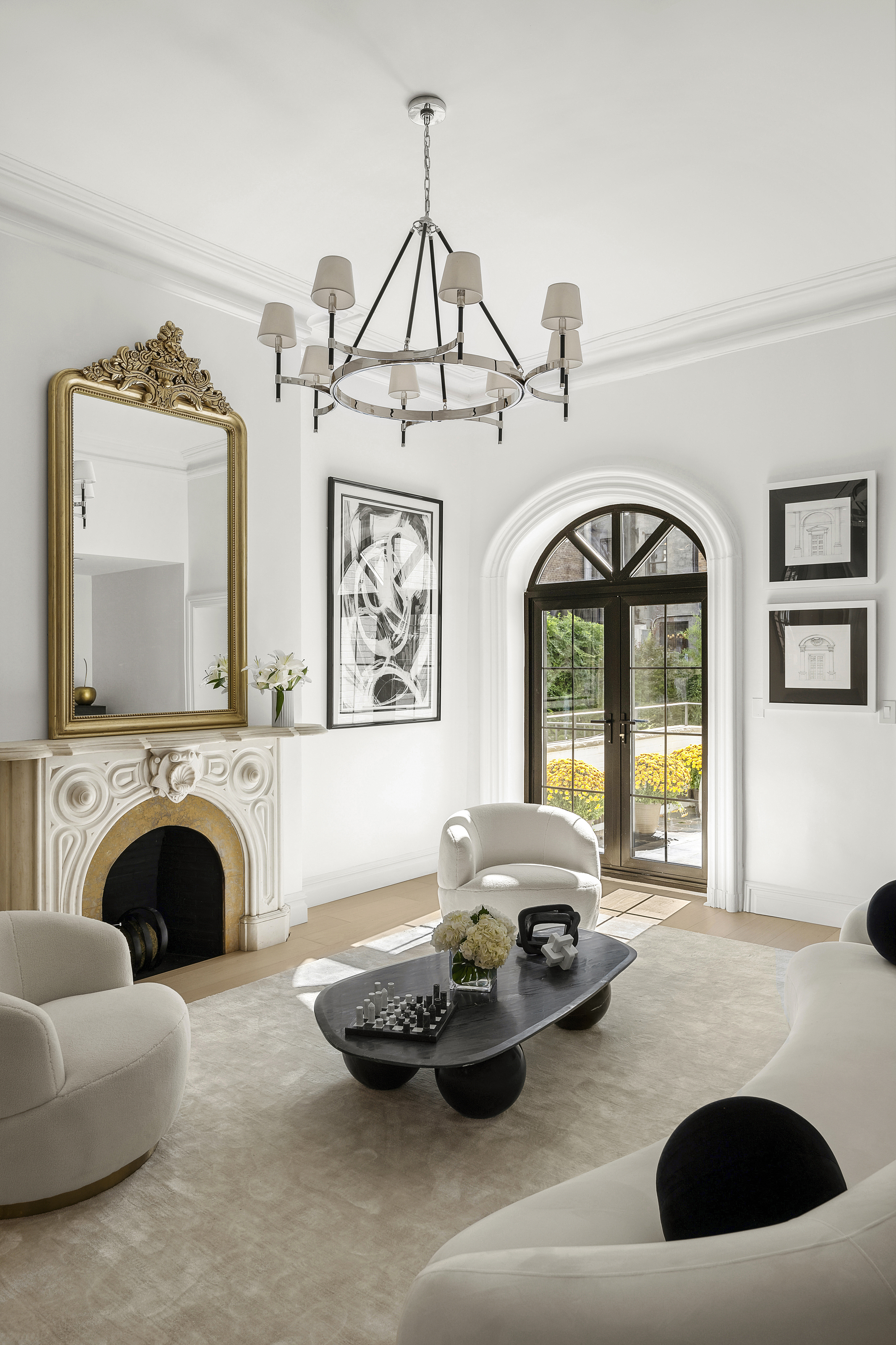 222 East 61st Street Manhattan, NY 10065 - Photo 5 of 32 a living room with furniture and a fireplace