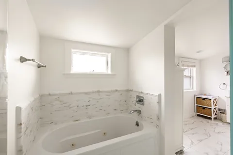 a bathroom with a bathtub
