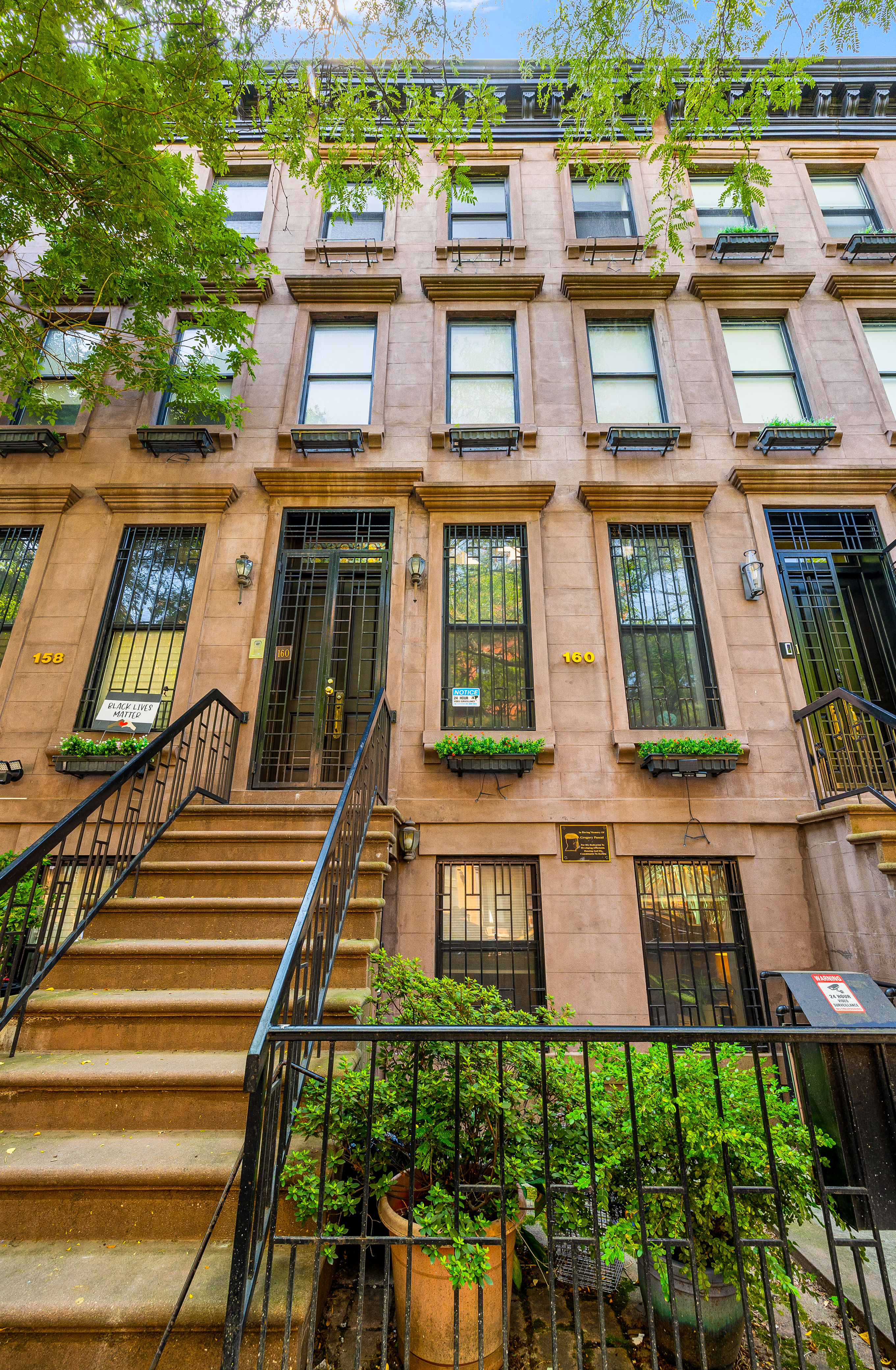 160 West 128th Street, Unit 1 Manhattan, NY 10027 - Photo 4 of 5 an aerial view of multiple houses