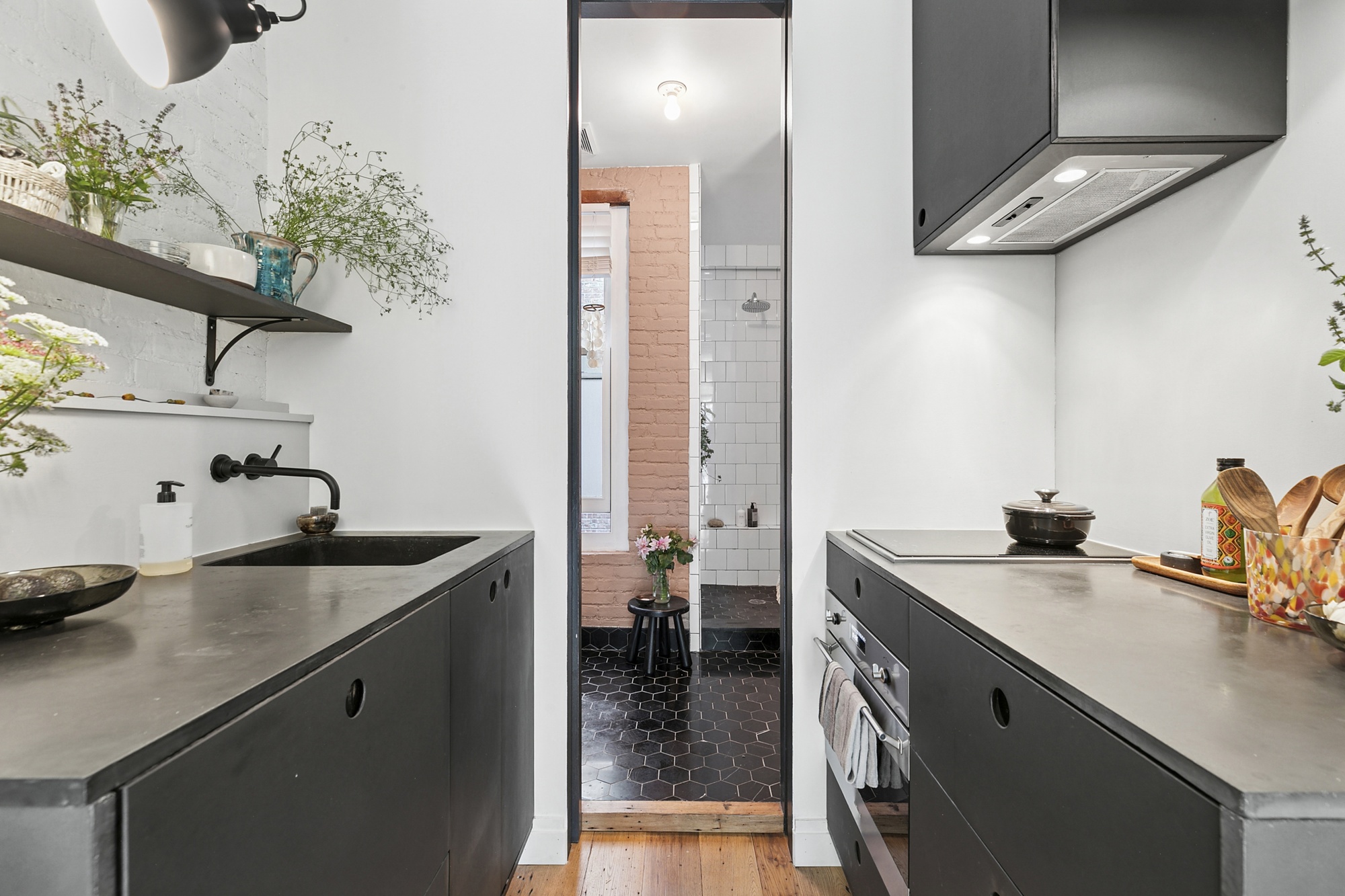 138 West 10th Street, Unit 2RW Manhattan, NY 10014 - Photo 4 of 10 a kitchen with a sink and cabinets