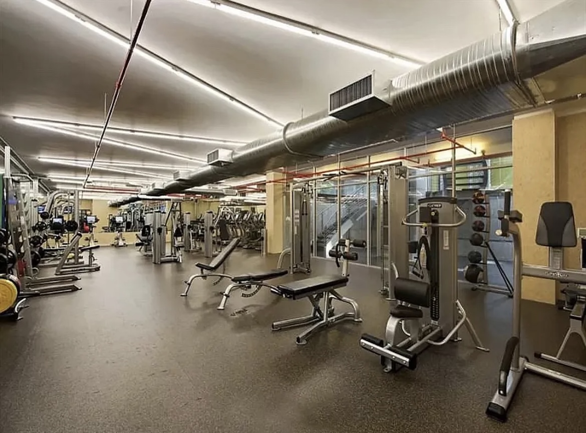 555 West 23rd Street, Unit S14E Manhattan, NY 10011 - Photo 6 of 8 a view of a room with gym equipment