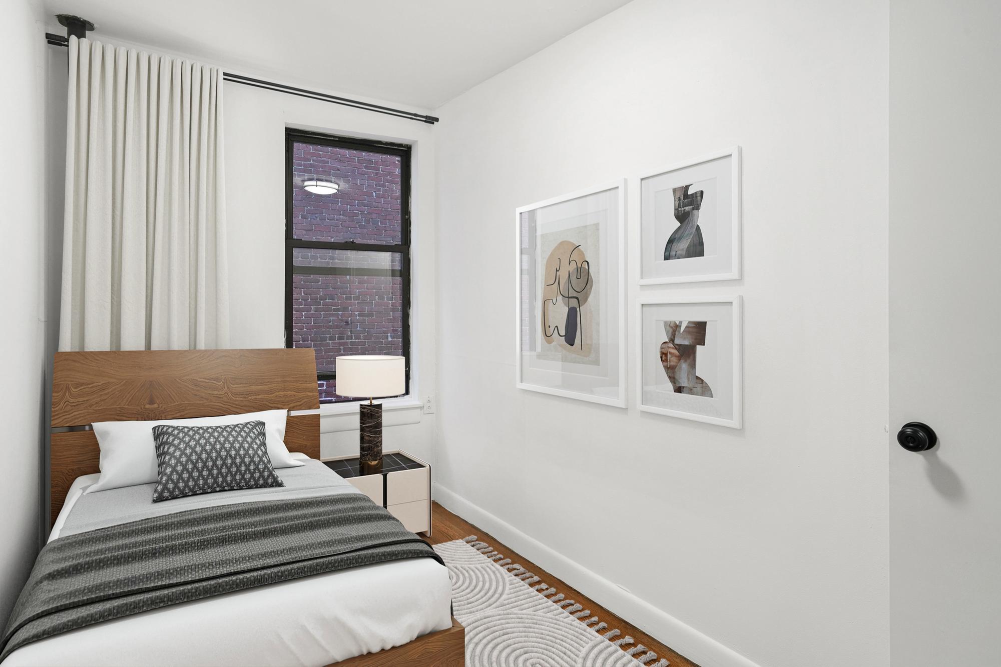 24 East 97th Street, Unit 6 Manhattan, NY 10128 - Photo 5 of 7 a bedroom with a bed and a painting on the wall