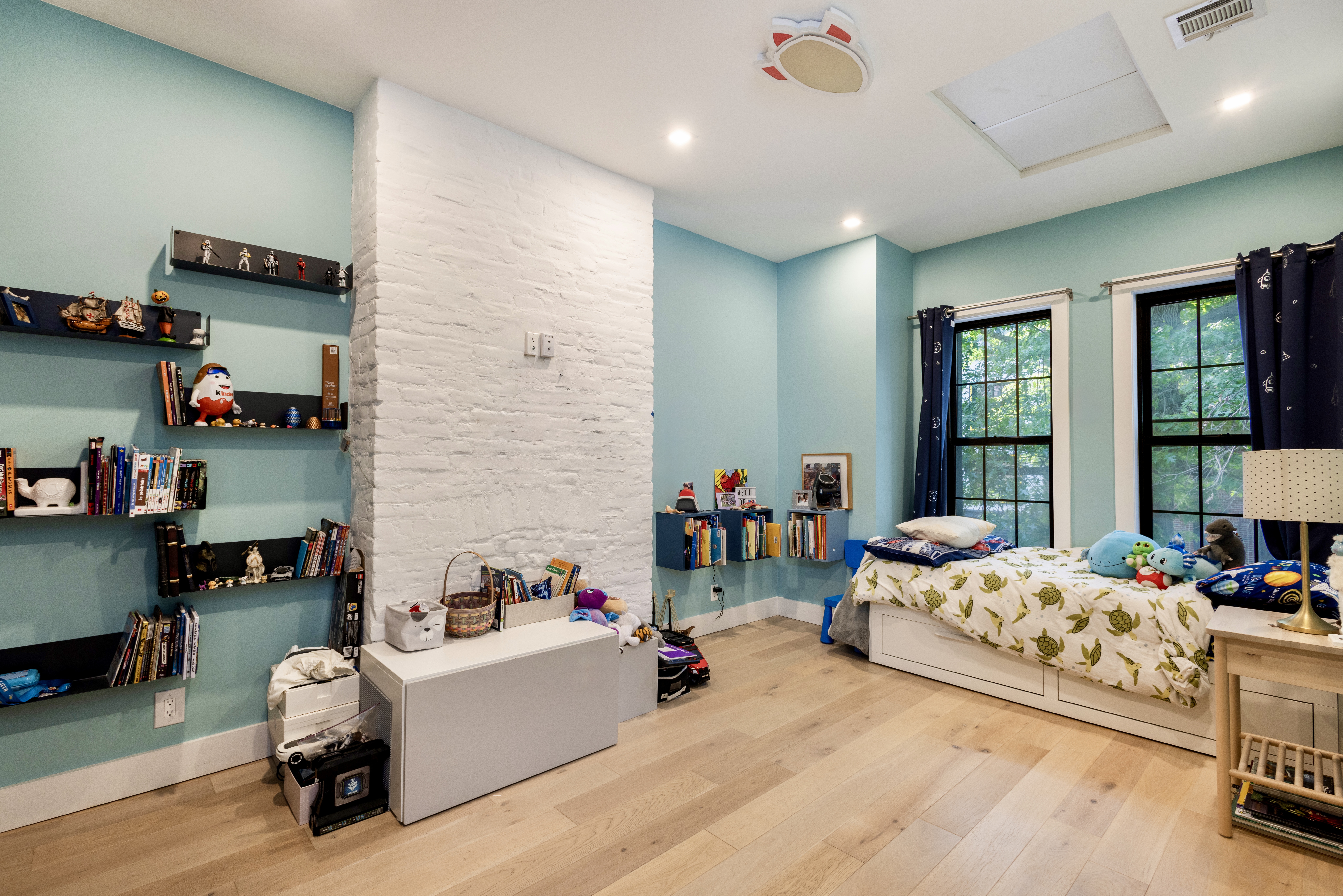 239 Winthrop Street Brooklyn, NY 11225 - Photo 16 of 20 a bedroom with furniture and a large window