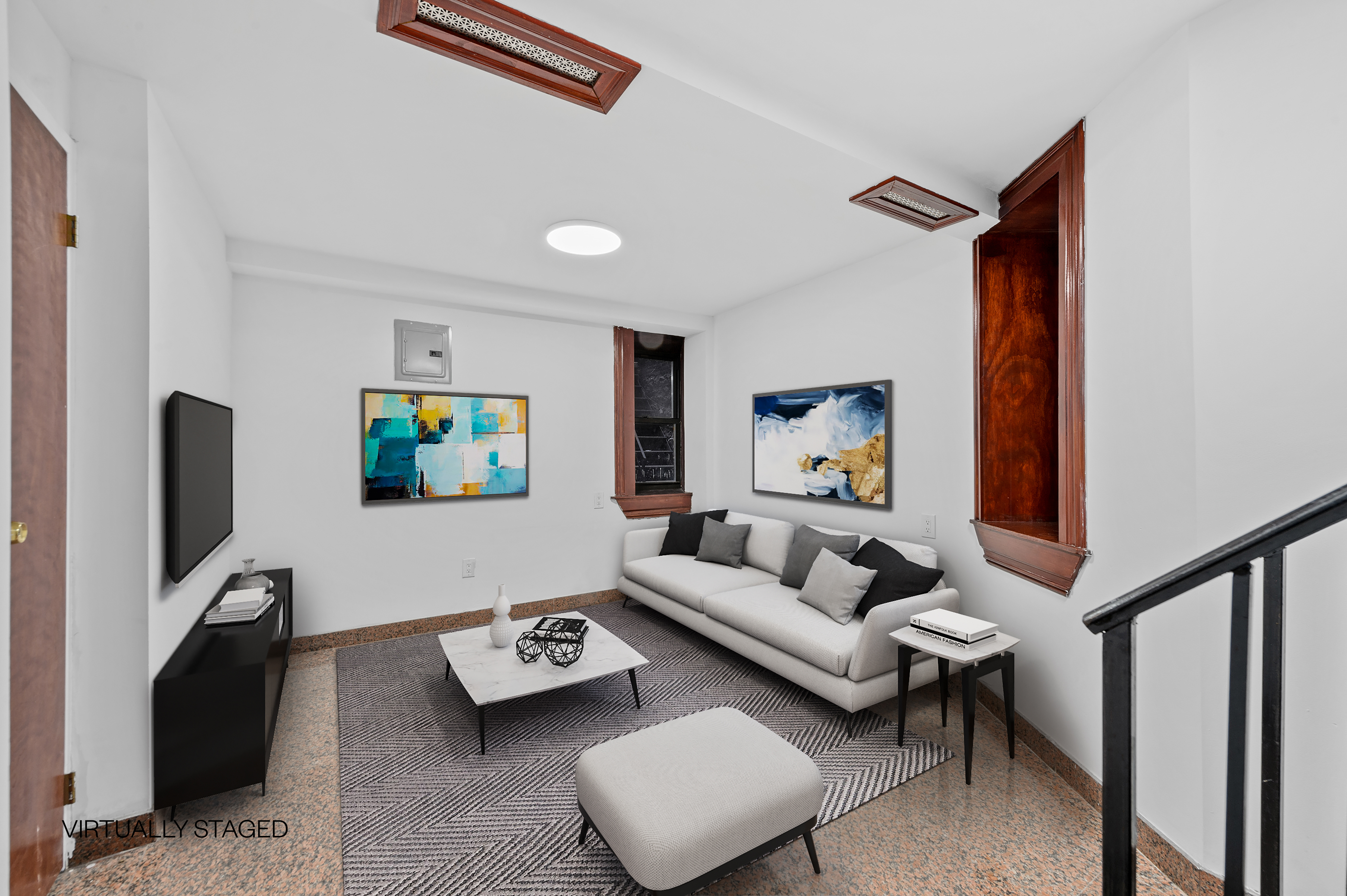 144 West 109th Street, Unit 1W Manhattan, NY 10025 - Photo 4 of 5 a living room with furniture and a flat screen tv