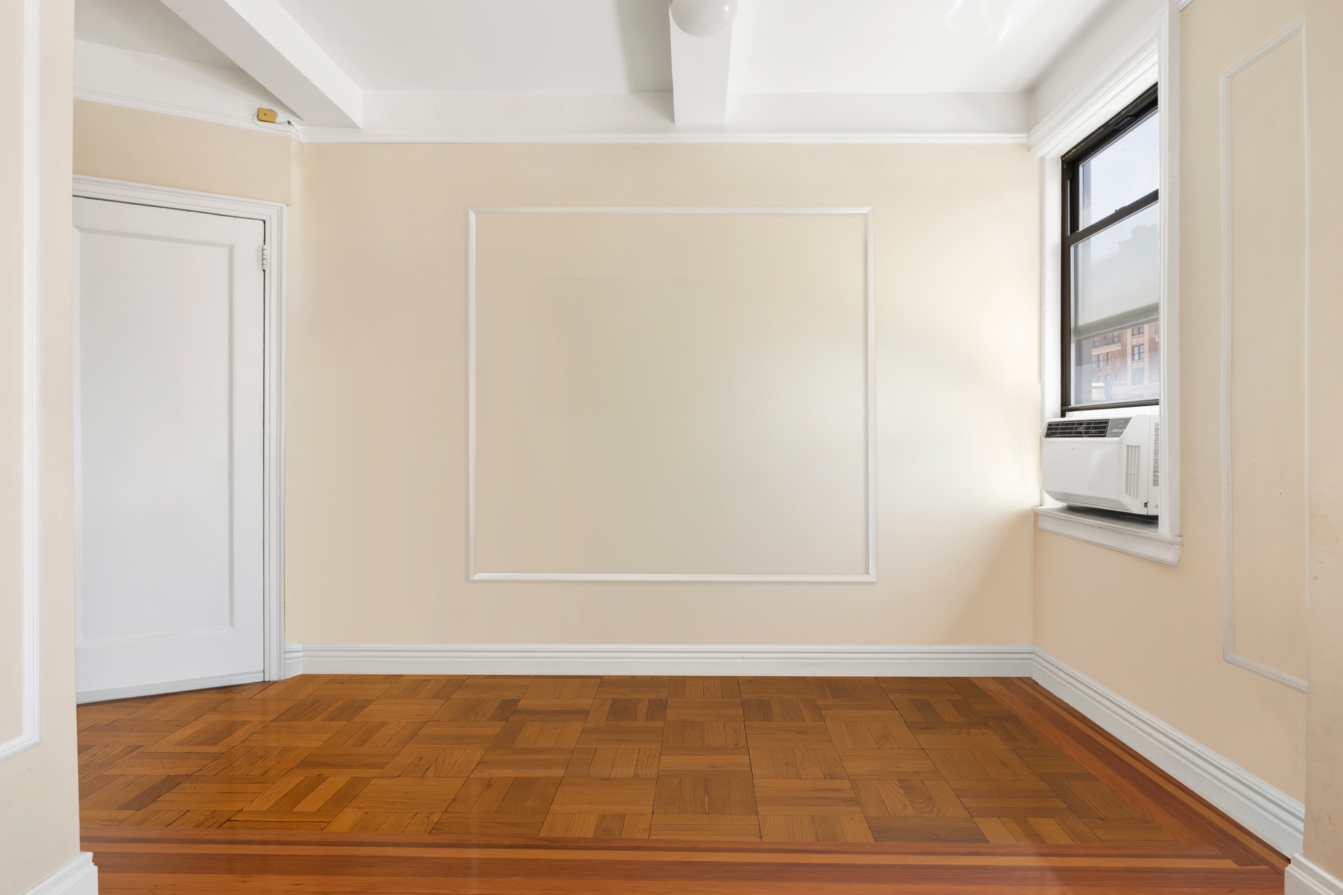 20 West 72nd Street, Unit 1106B Manhattan, NY 10023 - Photo 6 of 10 a view of empty room with wooden floor and fan
