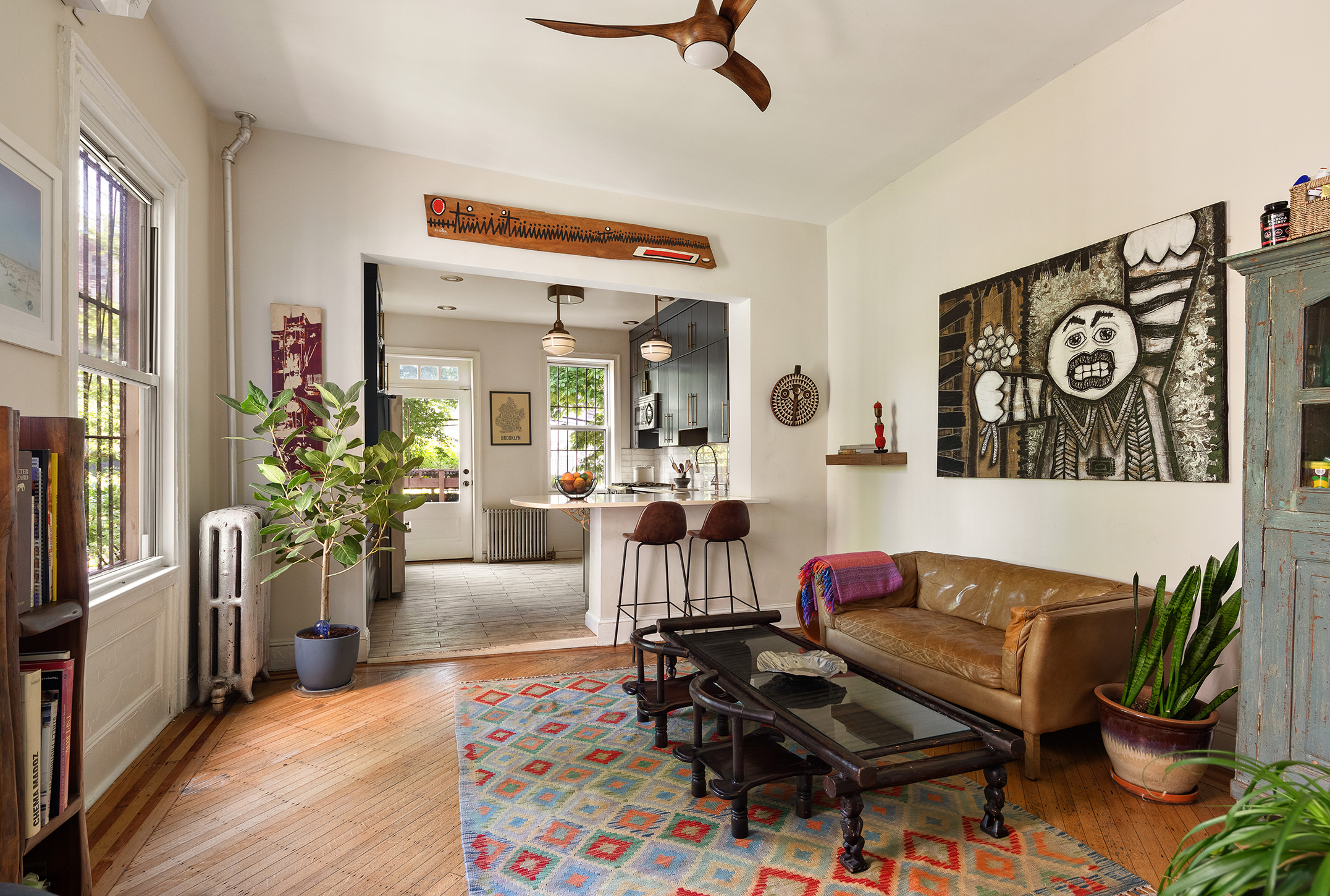123 Cambridge Place Brooklyn, NY 11238 - Photo 3 of 22 a living room with furniture and wooden floor