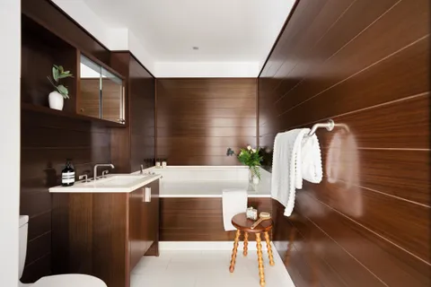 a bathroom with a sink and mirror