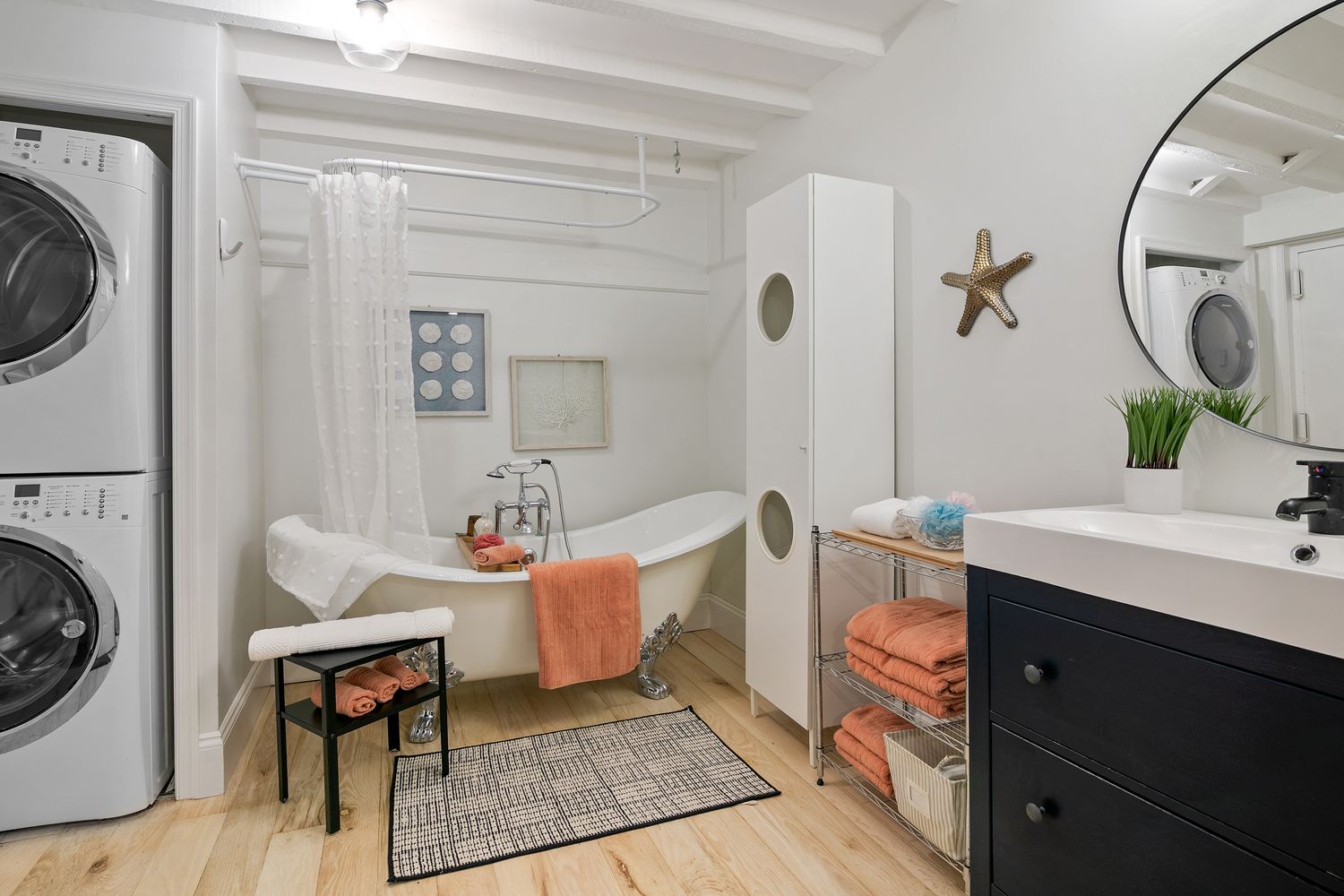 a living room with furniture a rug and a mirror