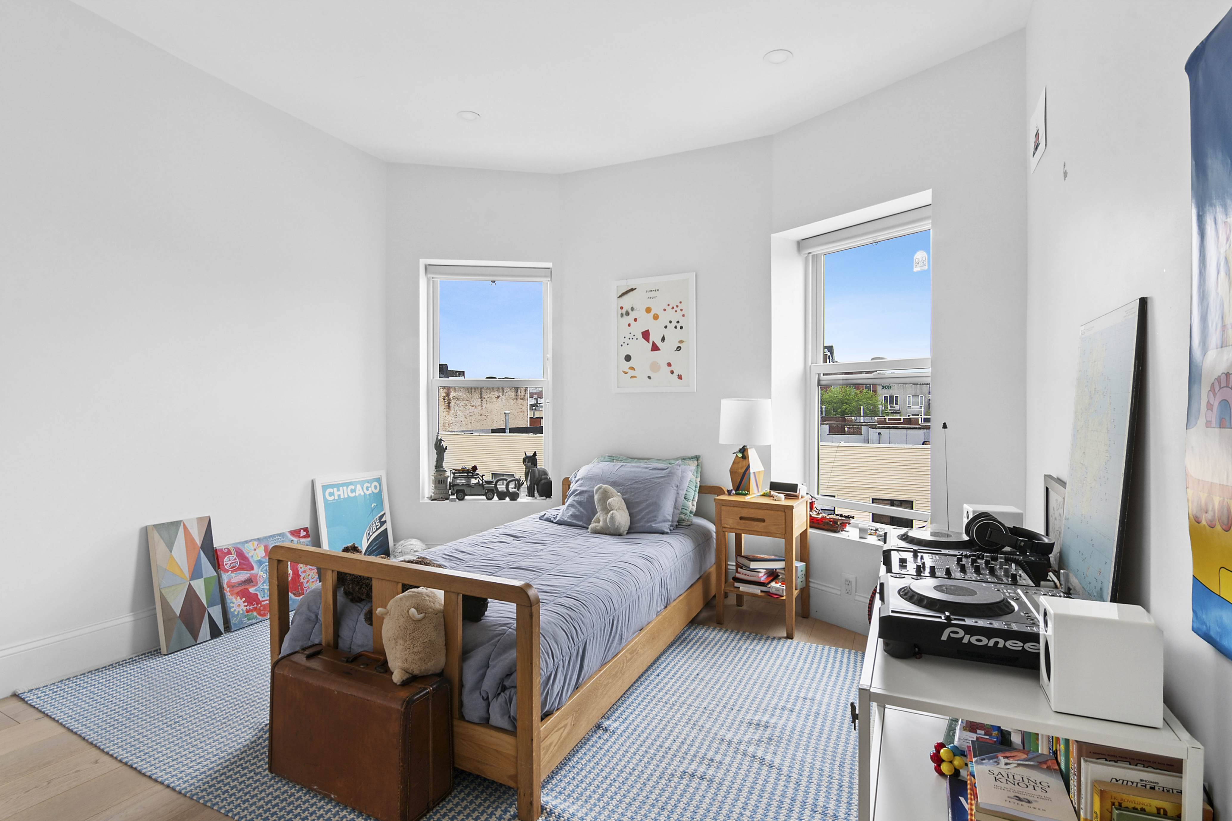 114 A Hart Street Brooklyn, NY 11206 - Photo 11 of 24 a bedroom with furniture and a window