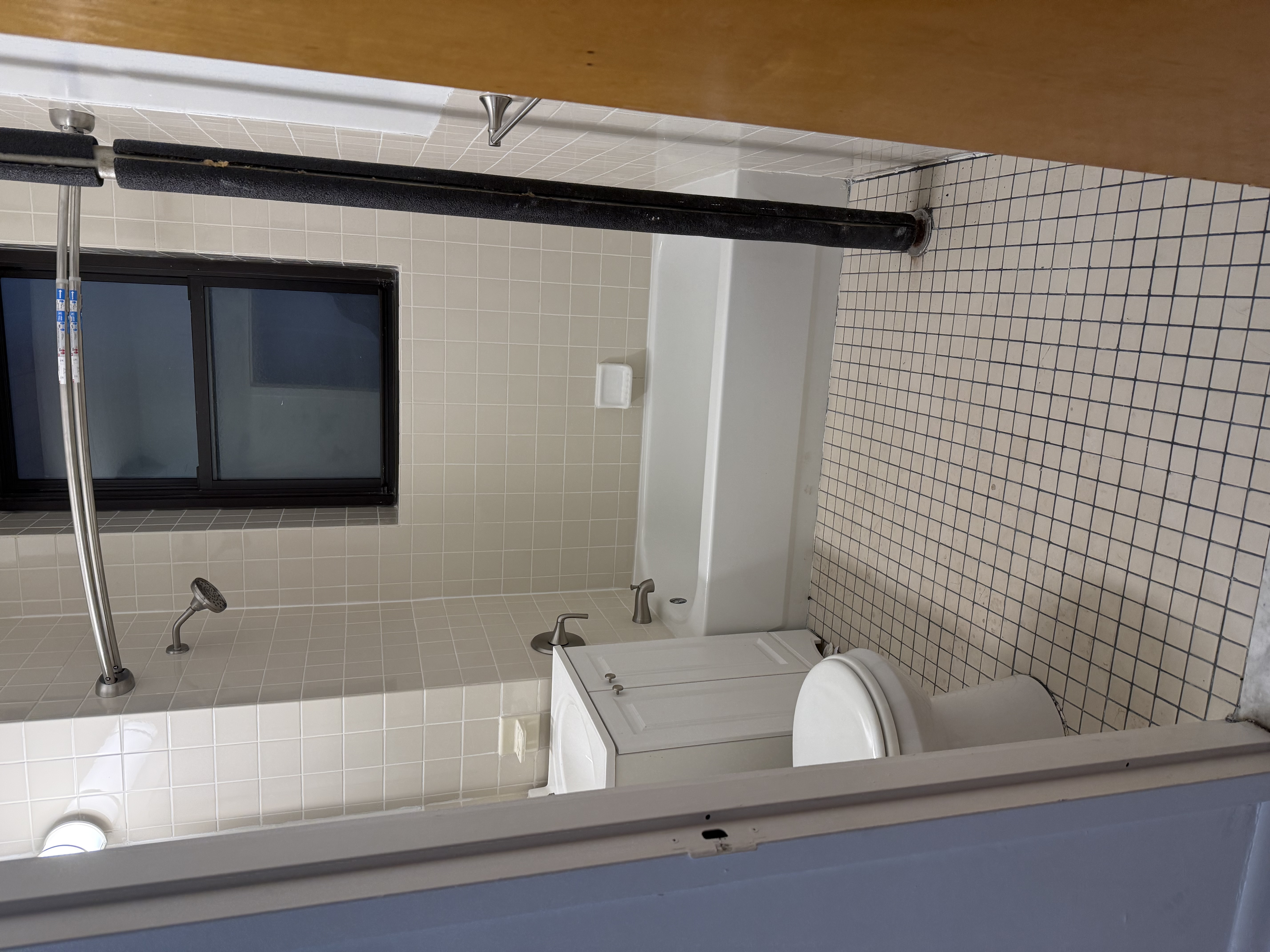 80 St Nicholas Avenue, Unit 1C Manhattan, NY 10026 - Photo 5 of 8 a bathroom with a toilet and a shower