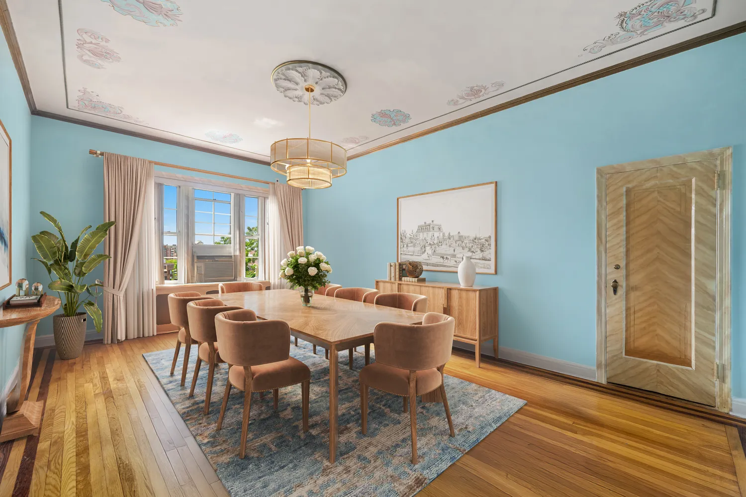 a view of a dining room with furniture window and wooden floor