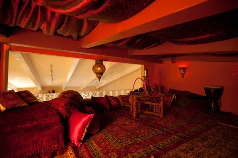 a view of balcony with furniture