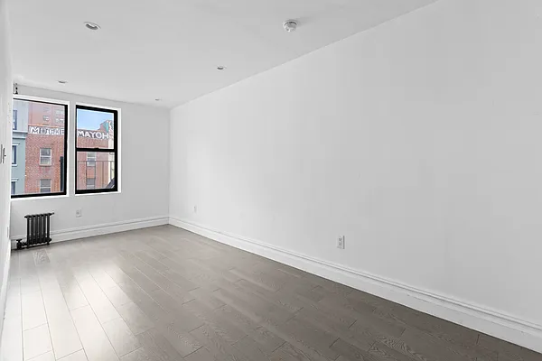 20 Avenue A, Unit 3AB Manhattan, NY 10009 - Photo 5 of 13 an empty room with a window