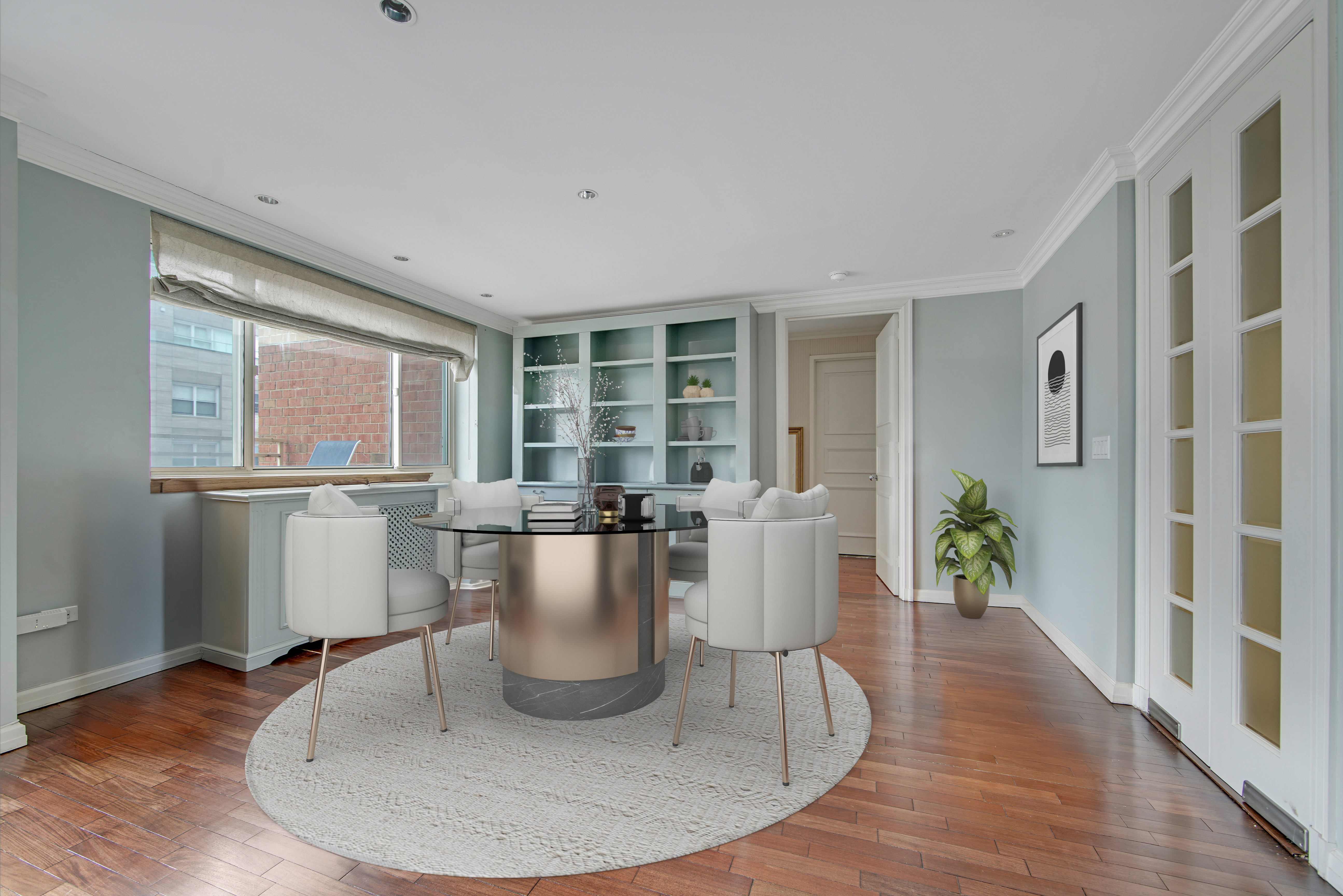 201 East 80th Street, Unit 16D Manhattan, NY 10075 - Photo 4 of 19 a living room with furniture and a potted plant