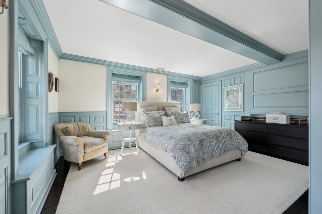 79 Pine Street Dover, MA 02030 - Photo 17 of 25 a living room with a bed and a couch