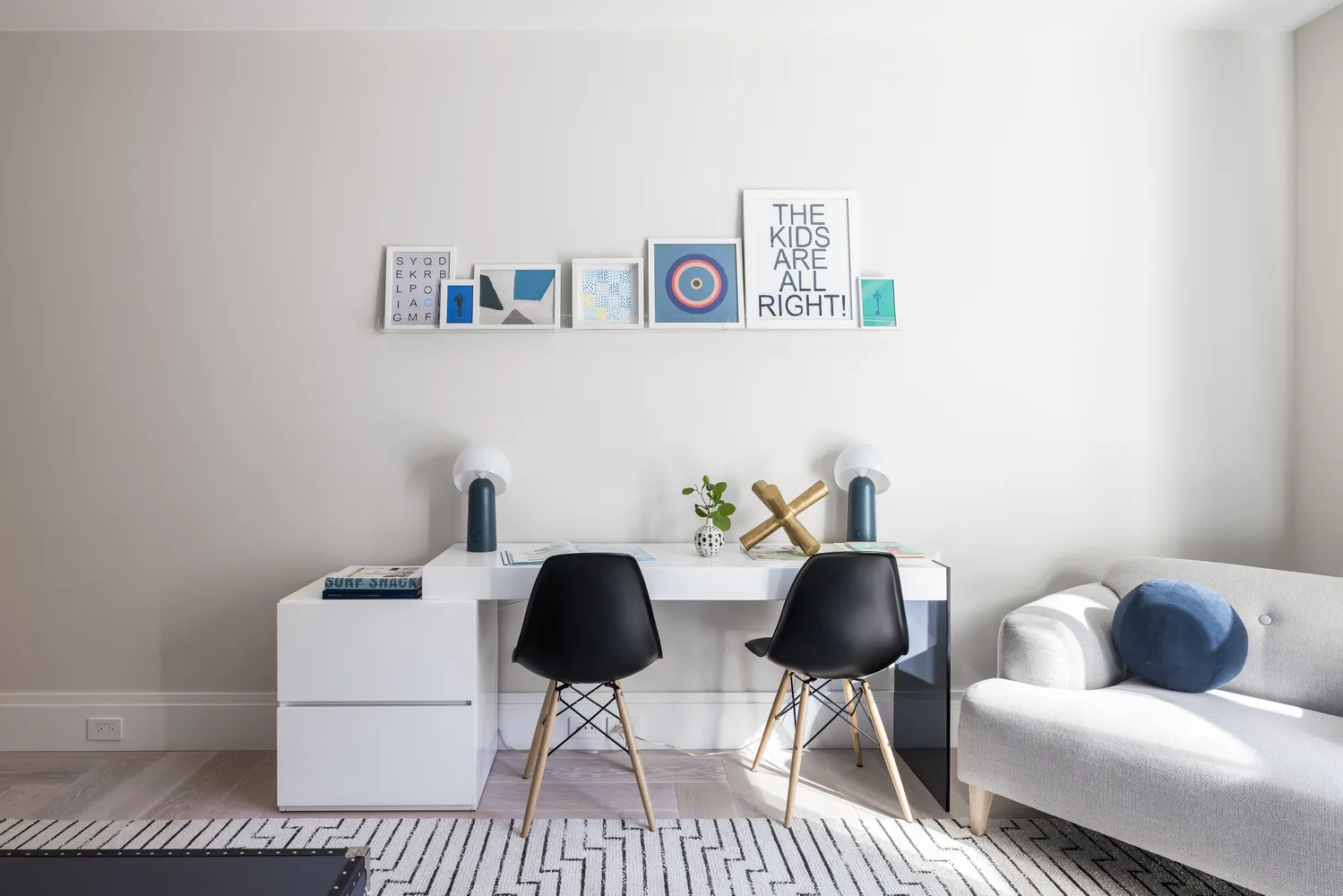 a work room with furniture and a couch
