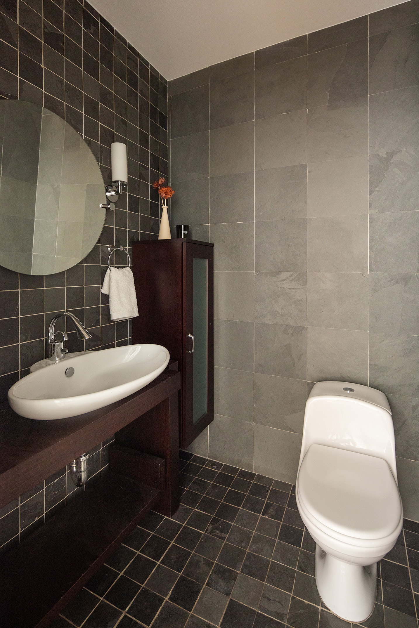 204 West Houston Street, Unit 4B Manhattan, NY 10014 - Photo 8 of 10 a bathroom with a sink toilet and shower