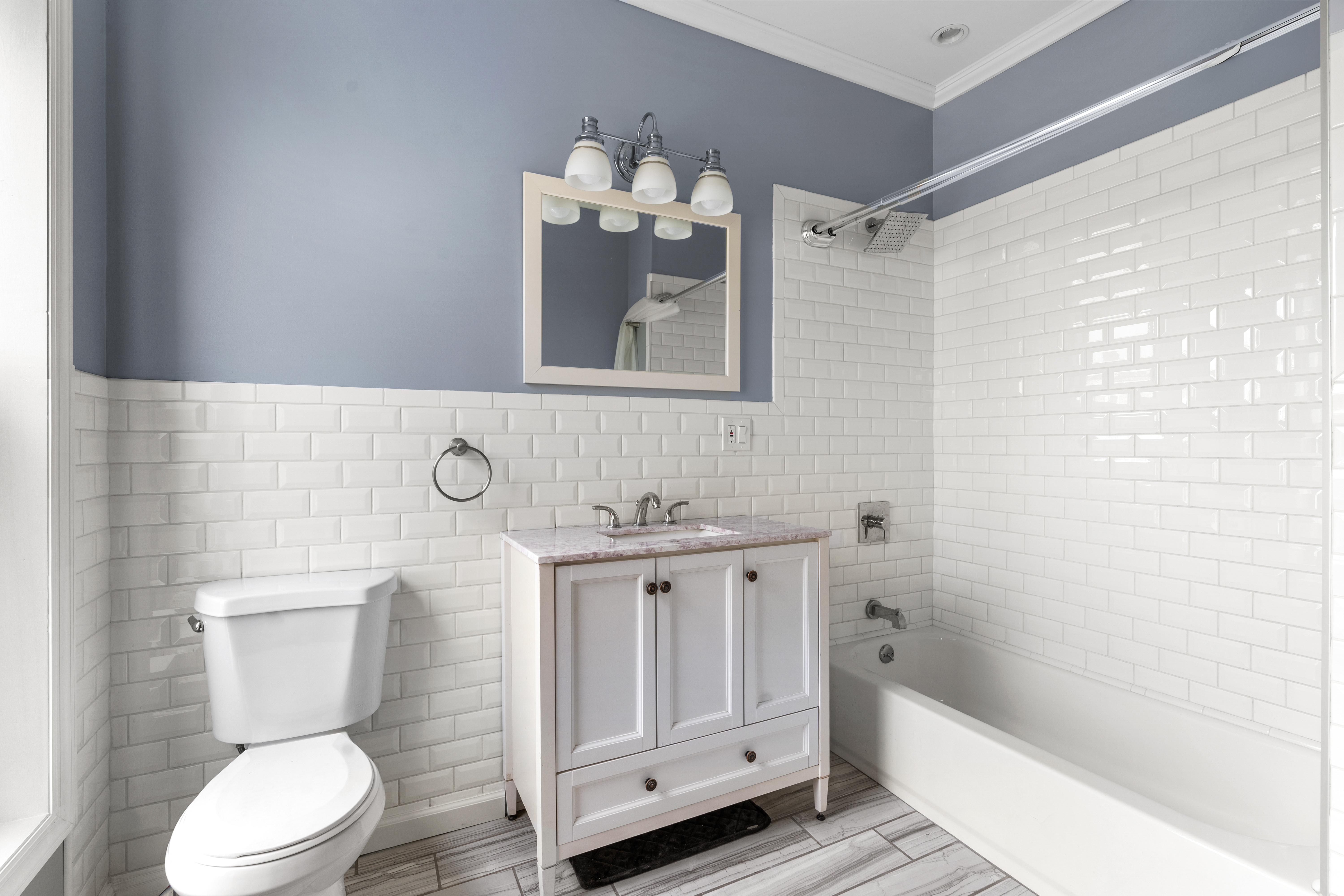 615 Putnam Avenue, Unit 4 Brooklyn, NY 11221 - Photo 7 of 10 a bathroom with a sink a toilet and shower