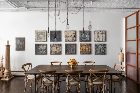 a view of a workspace with furniture